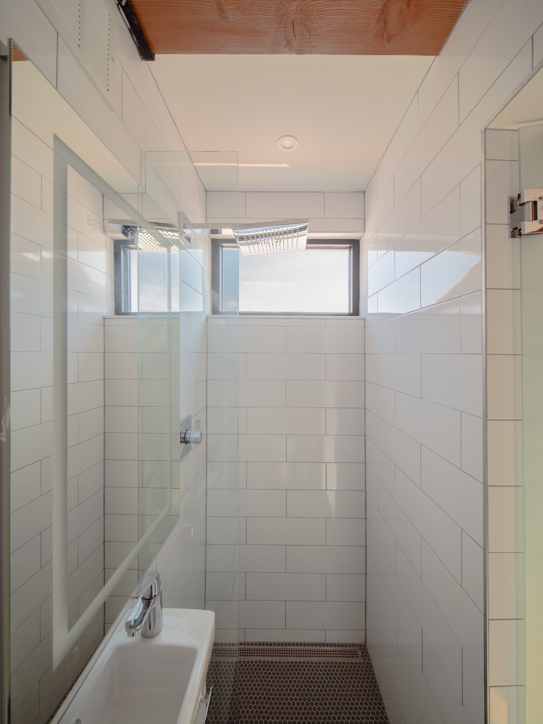 Mezzanine Bathroom Shower | Charlottesville Loft Apartment | PARABOLA Architecture | Kevin Burke Photography | Copyright 2023