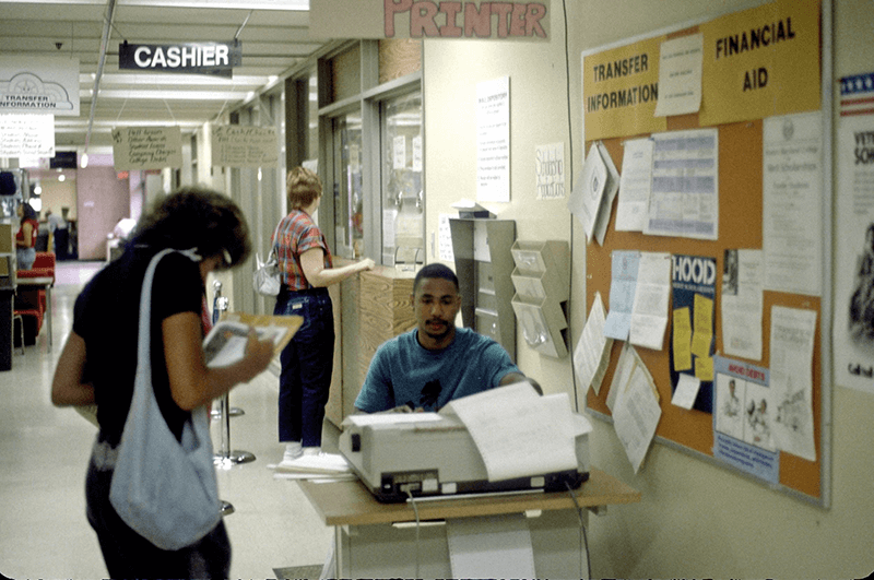Records and Cashier office, Administration building (First floor facing east), Students, 1987