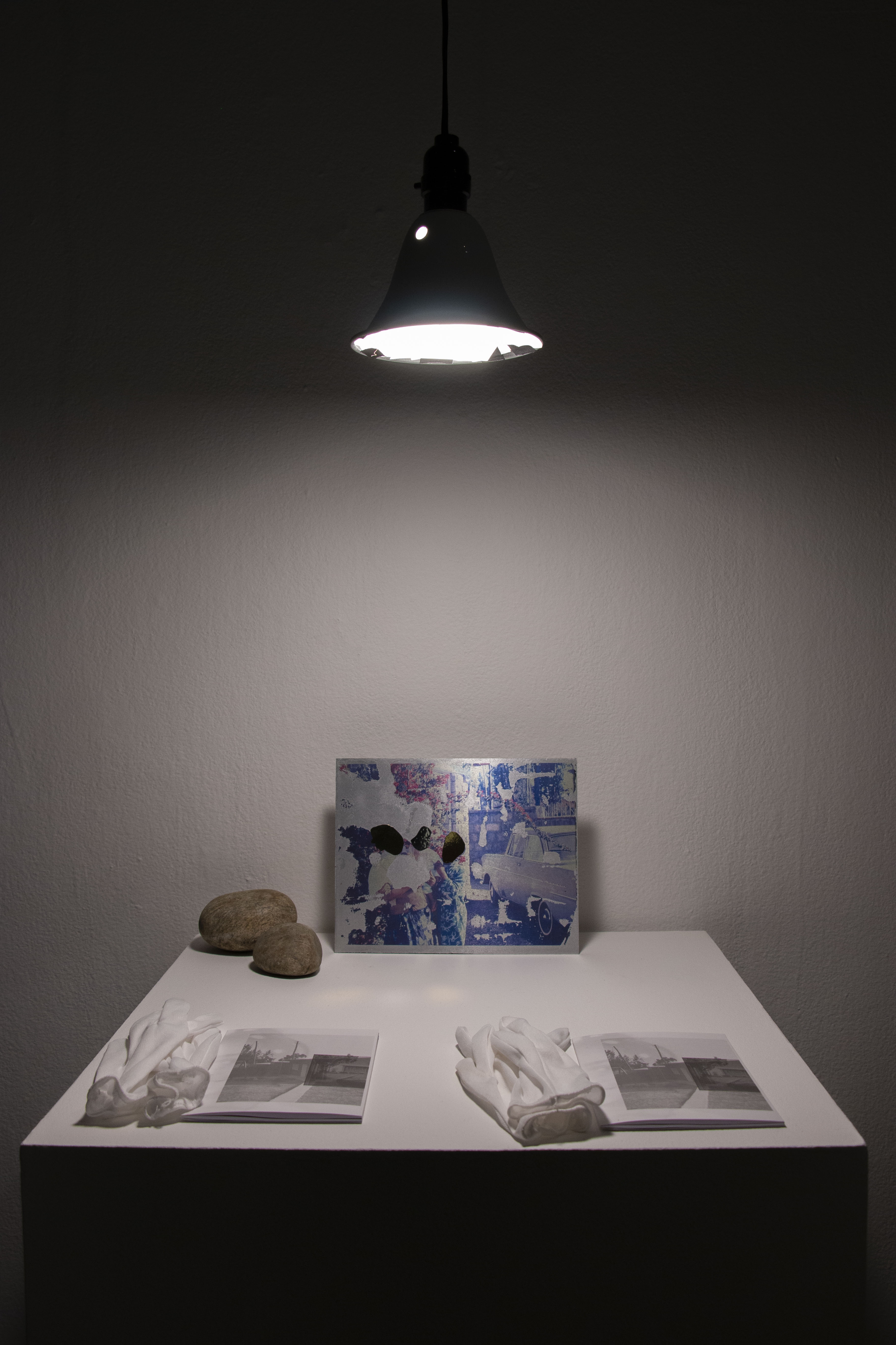 conjugating History, 2019  artist book, 5 x 7 inches, edition of 100 water photo transfer, aluminum plate, 10 x 8 inches, rocks