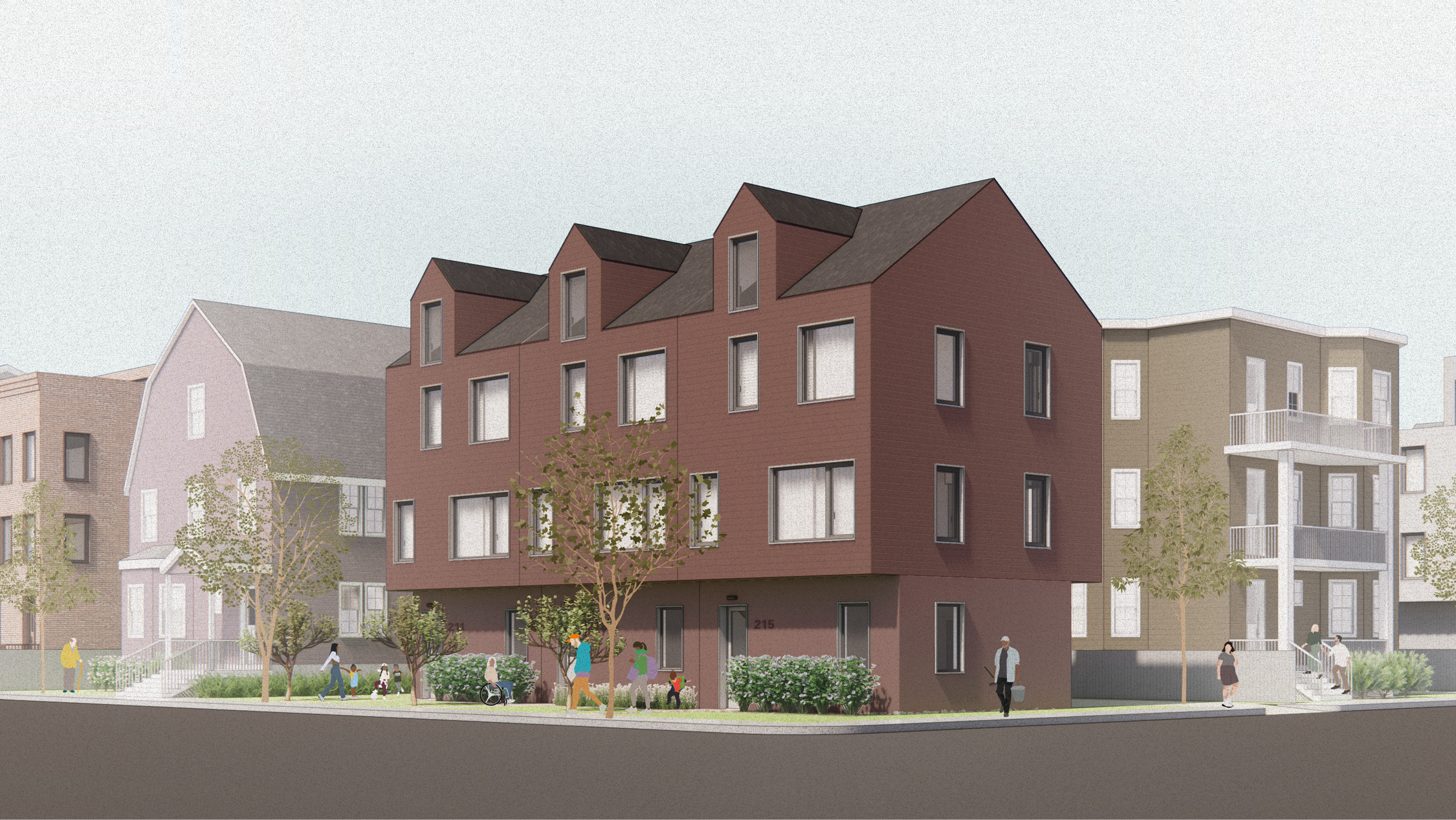 Three townhouses on a corner lot with garages at the rear