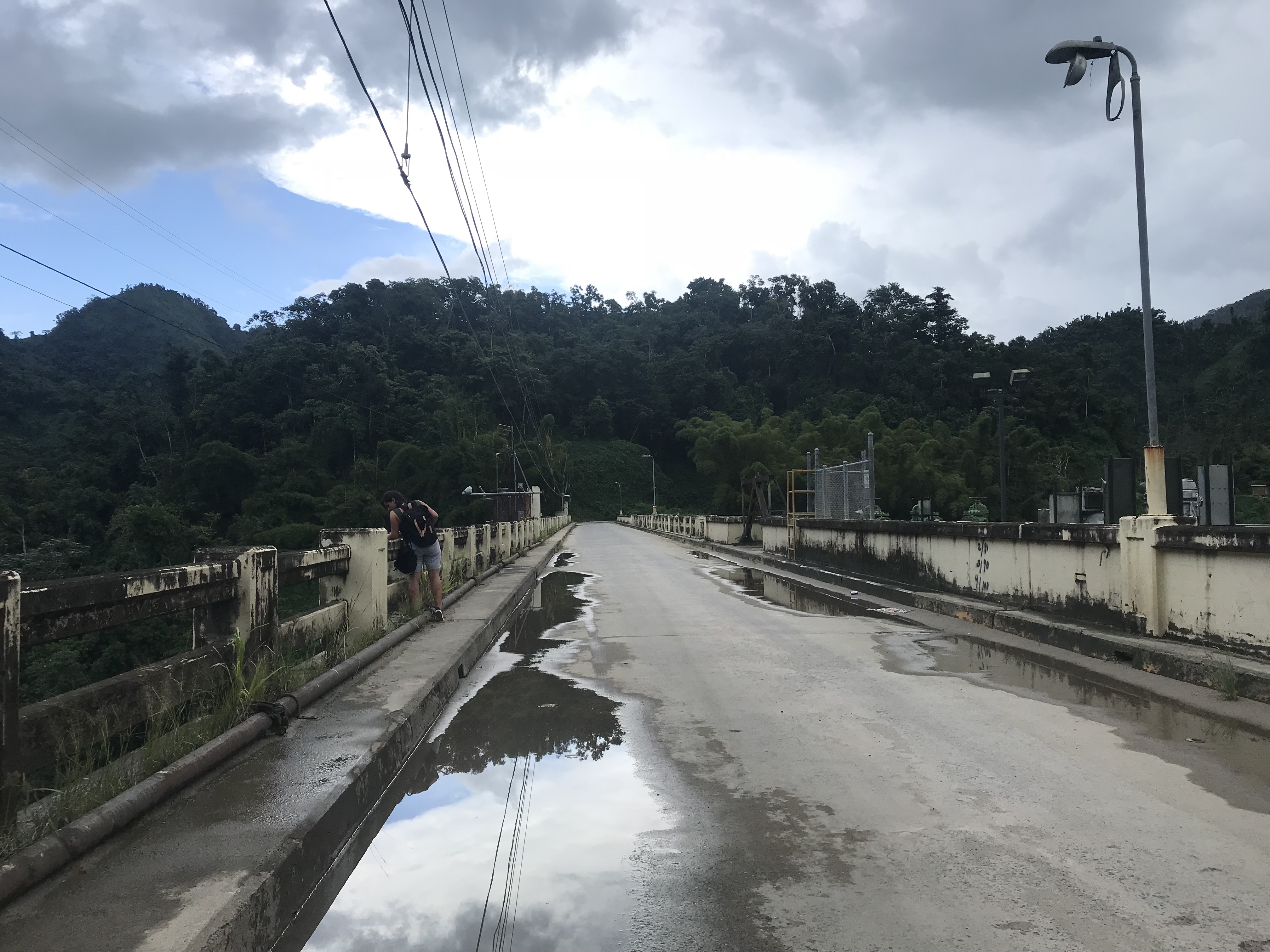 A bridge spanning over the Lago Dos Bocas Dam, a hydroelectric generation facility, between the municipalities of Arecibo and Utuado.