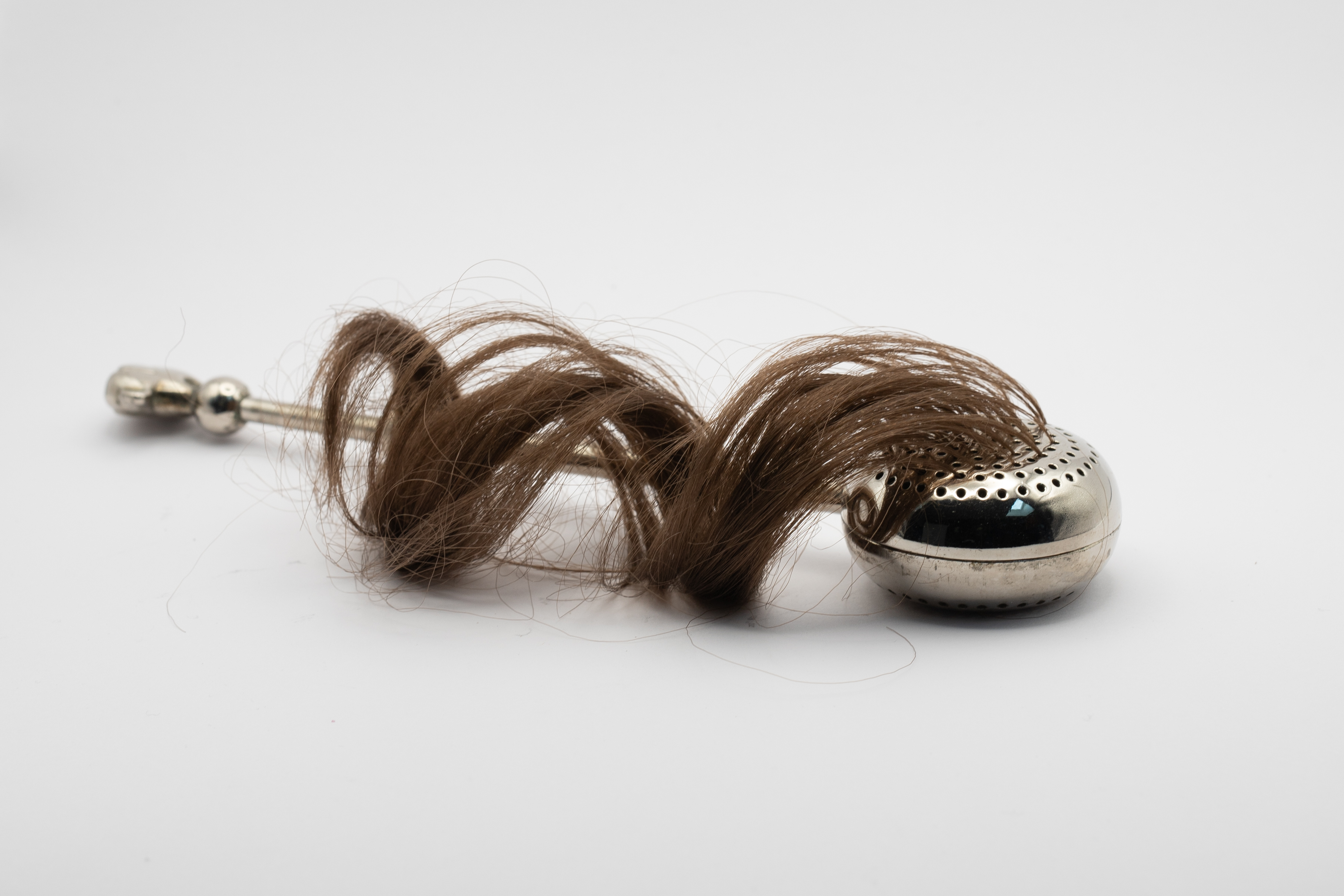 UntitledMixed Media with a tea strainer, hair25 x 12 x 5 cm