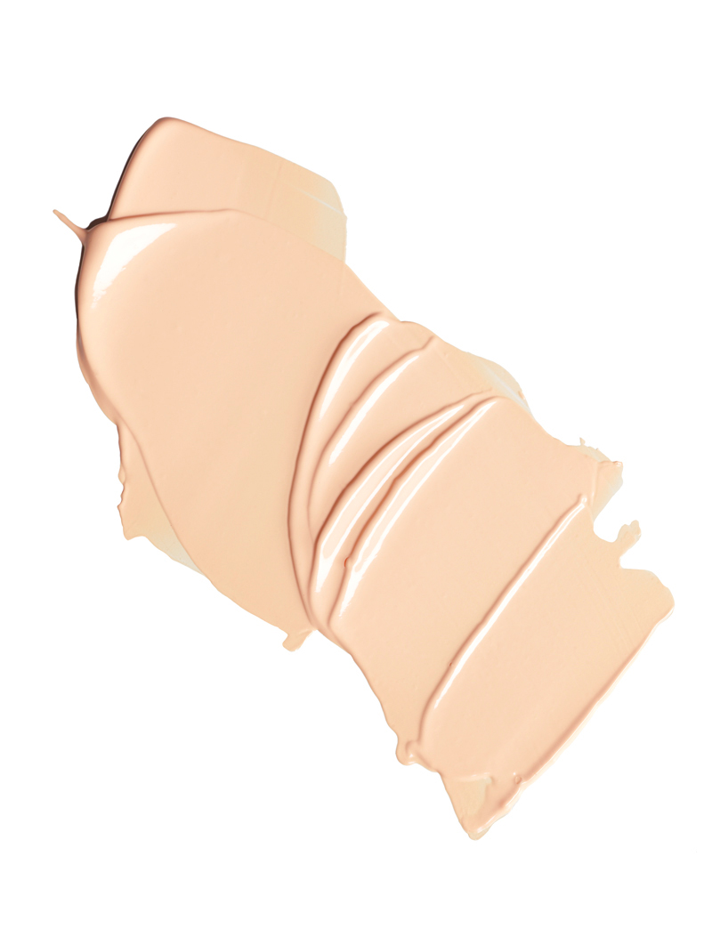 KMA photographer Isabelle Bonjean shoots a photograph of a creamy and tined face moisturizer 