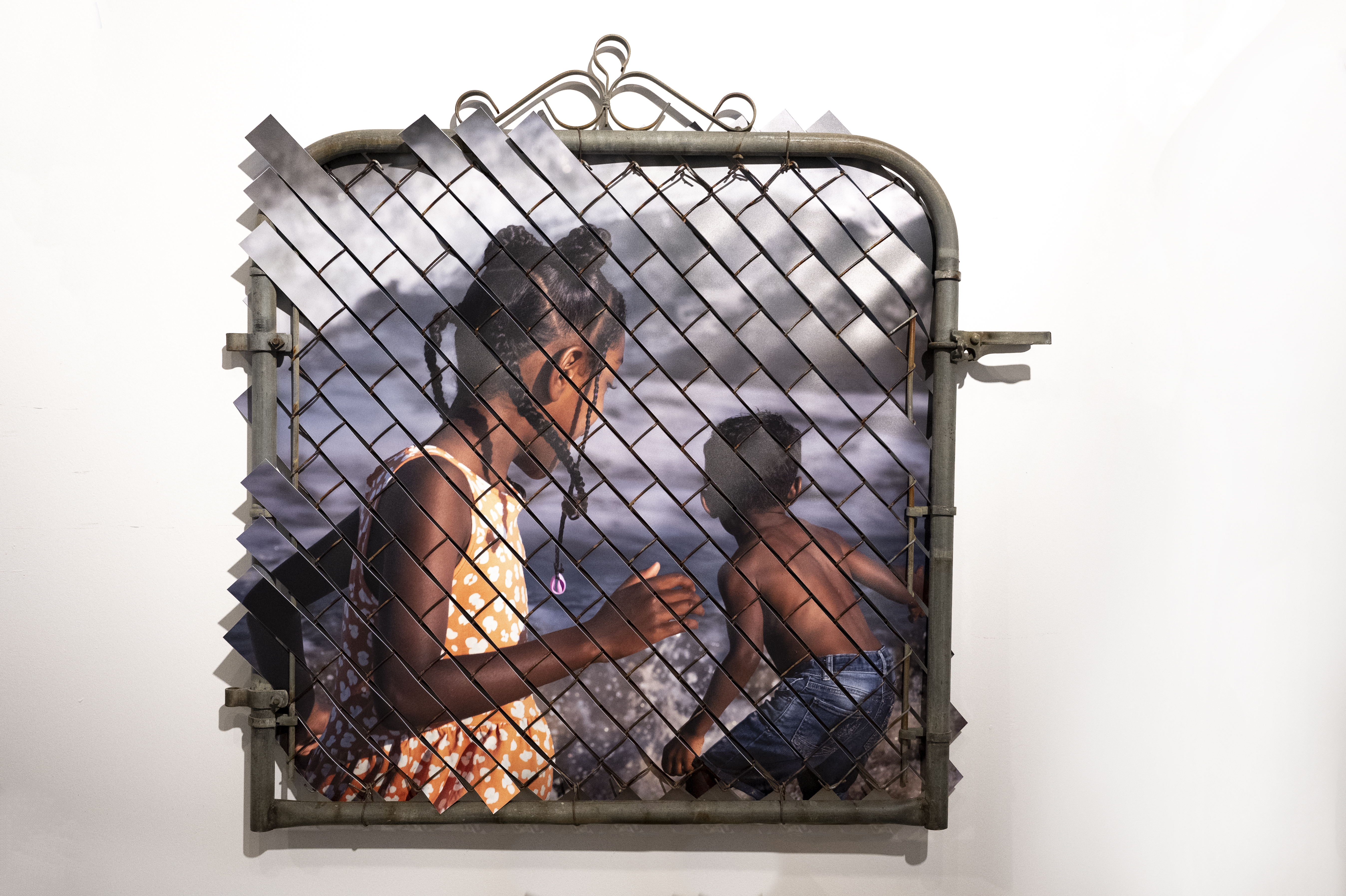 Adorations (Generational Joy), 2023 salvaged steel gate, chain link mesh, and UV print on synthetic resin 39 x 46 in x 2 1/2 in | 99.06 x 116.84 x 6.35 cm