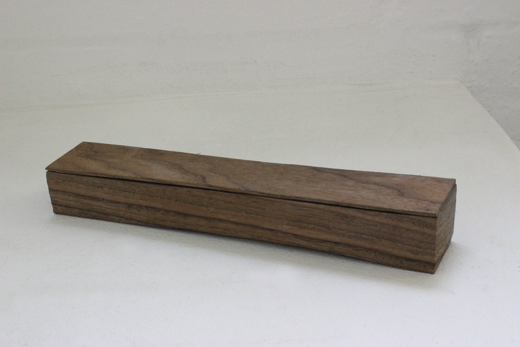 Box. American walnut, silvered copper wire, tar  7 x  32 cm