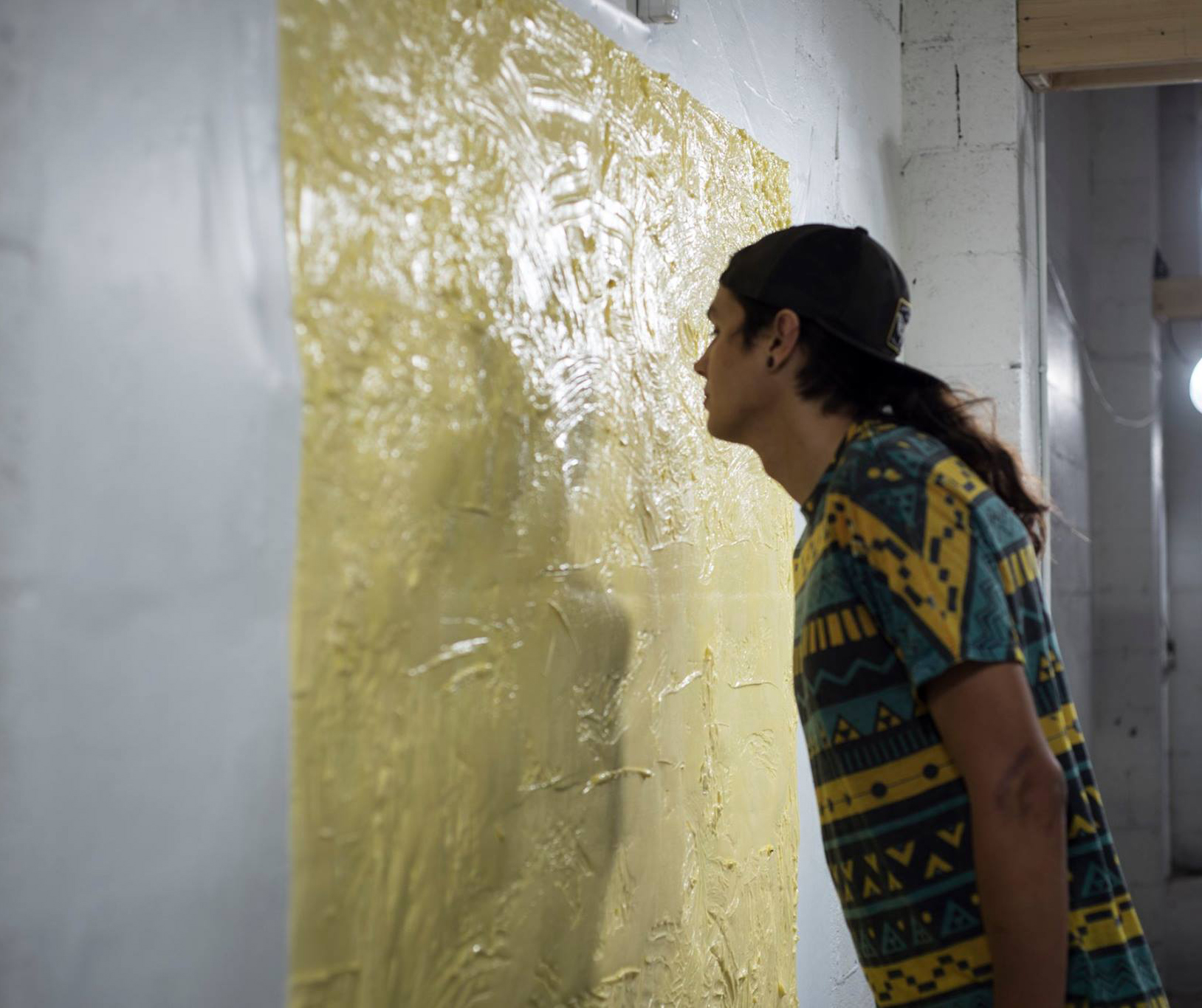 3/4 — BUTTER SQUARE(S).  Butter Square. 4.15.16   Site-specific installation, designed for the exhibition Cherry Pie at Union Shop Gallery, Charlotte, NC; 35 lbs. margarine, wall, 84” x 72”; 2016.