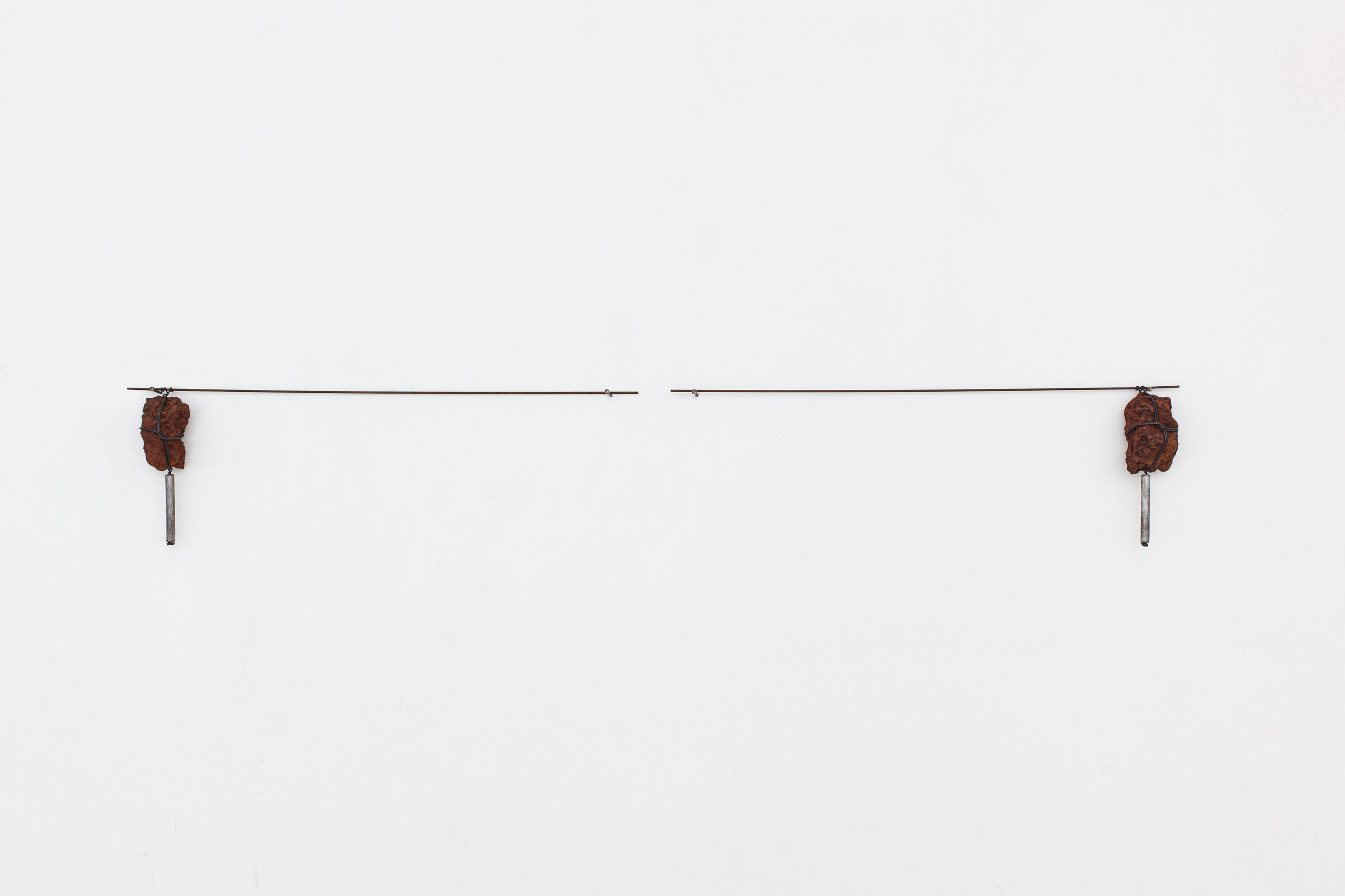 UNTIL SOMETHING THINKS ME INWARDS 14Iron ore, iron and lead. 17 x 107 x 6 cm. 2023