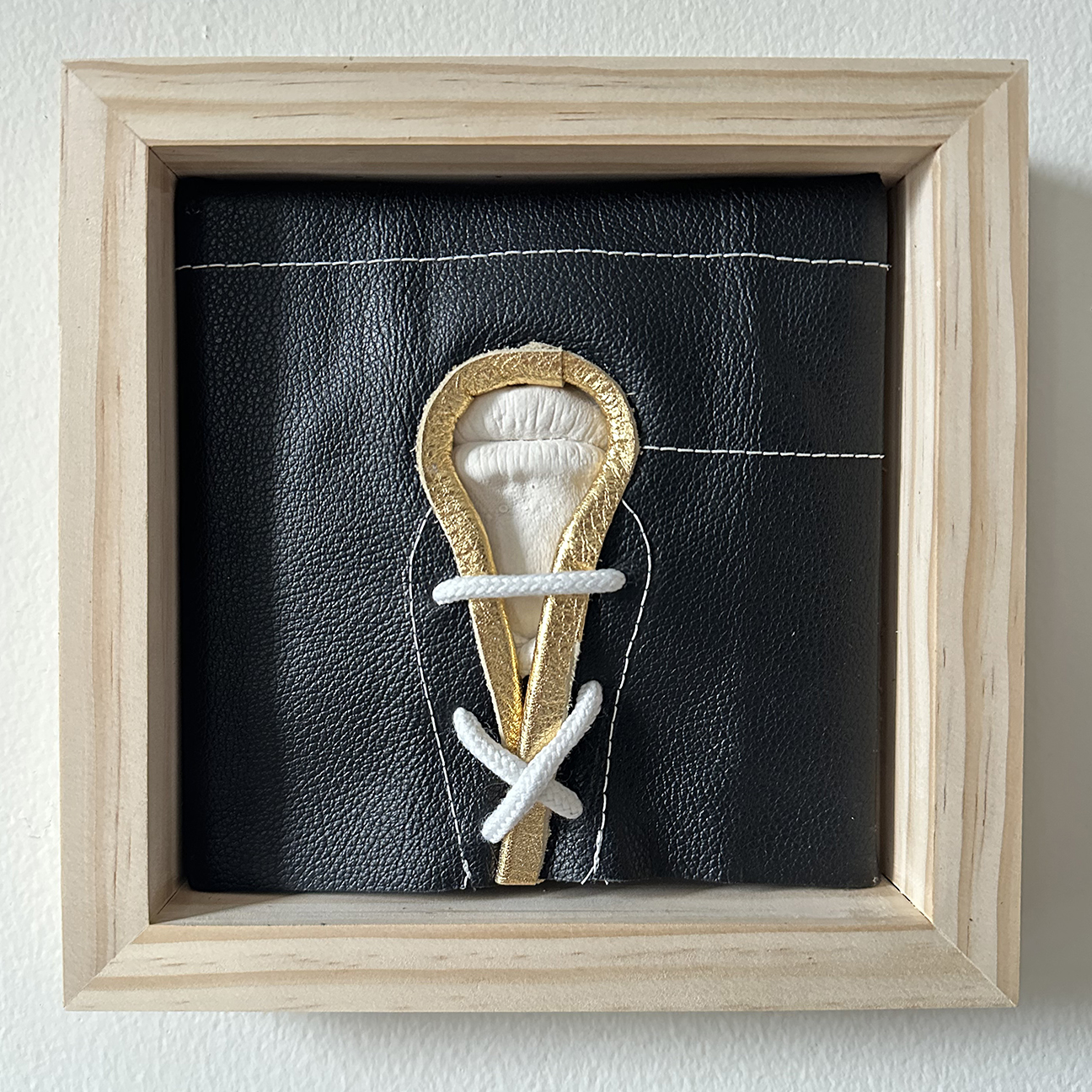 Closet, Key Hole, Whisper / plaster, leather, polyester cord, wood frame / 8 x 8 x 1 3/4 in / 2026