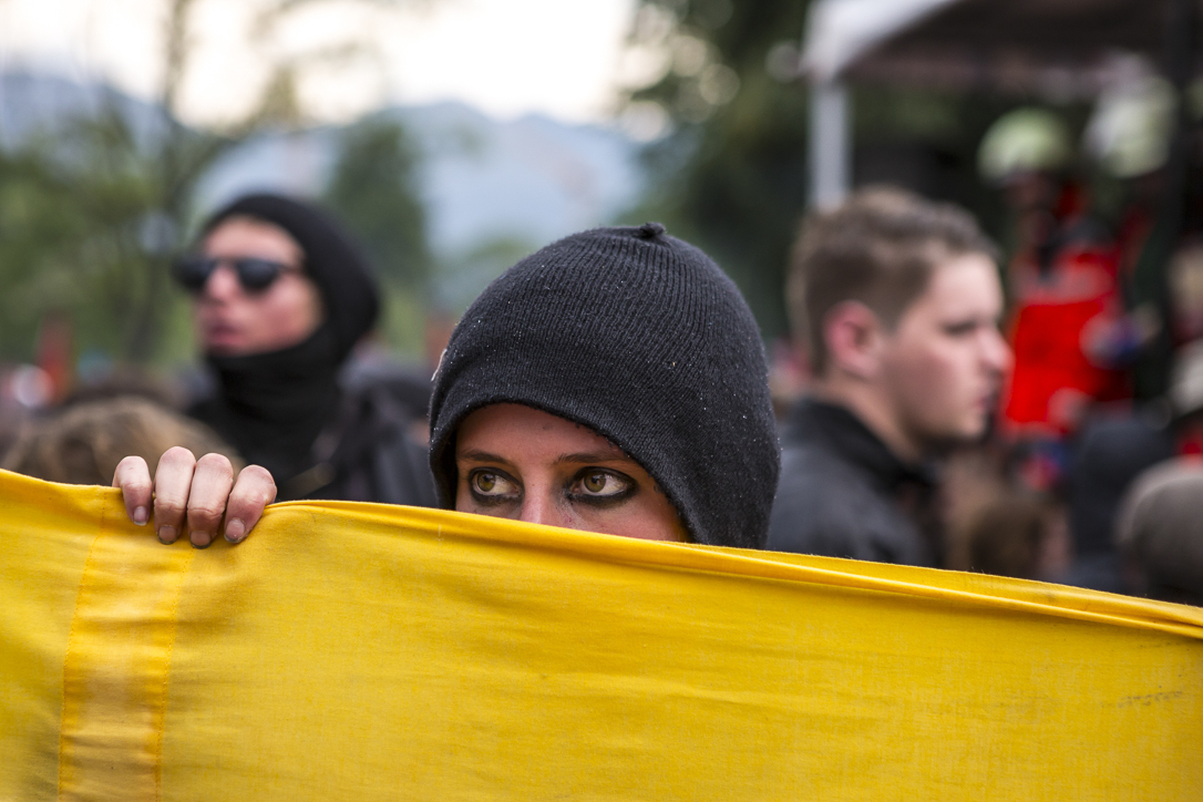 protester at G7 summit, 2015