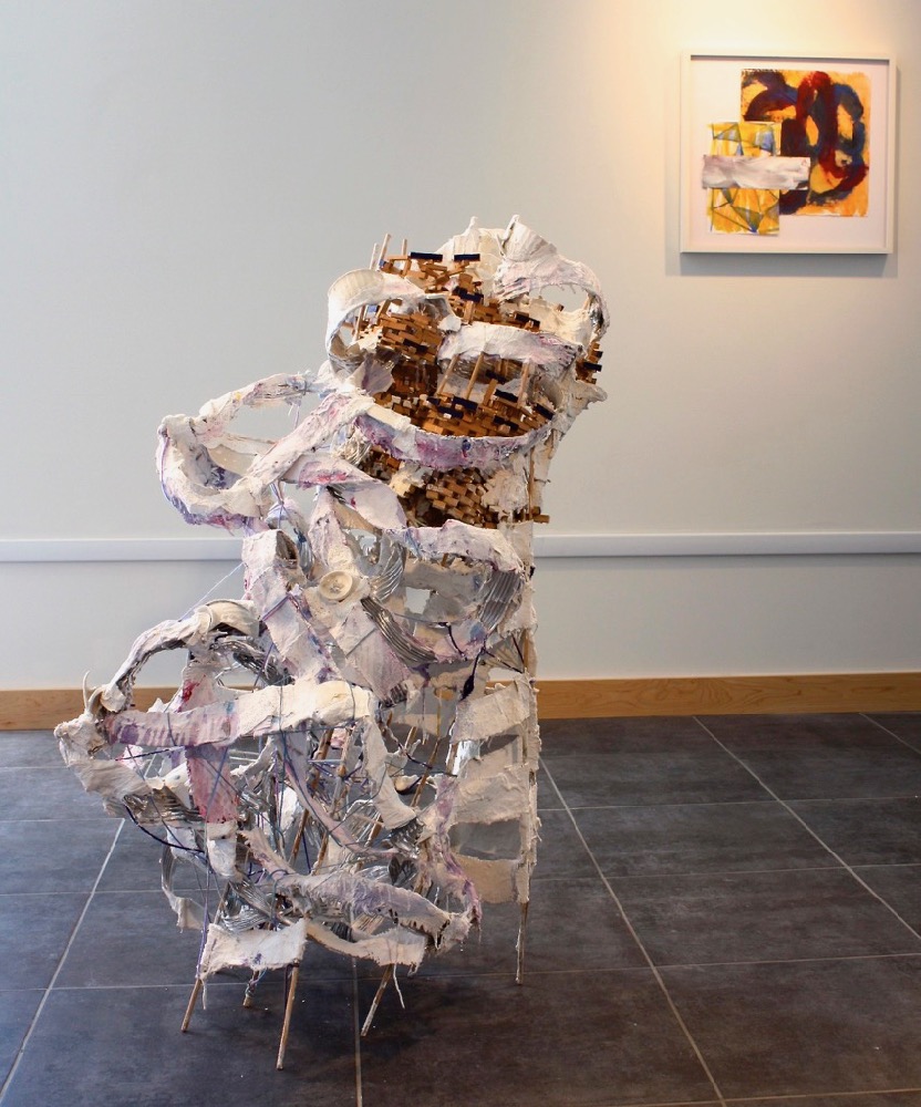 In a Whirl, 2012, plaster, found objects, yarn and wood, 46” x 43” x 22”