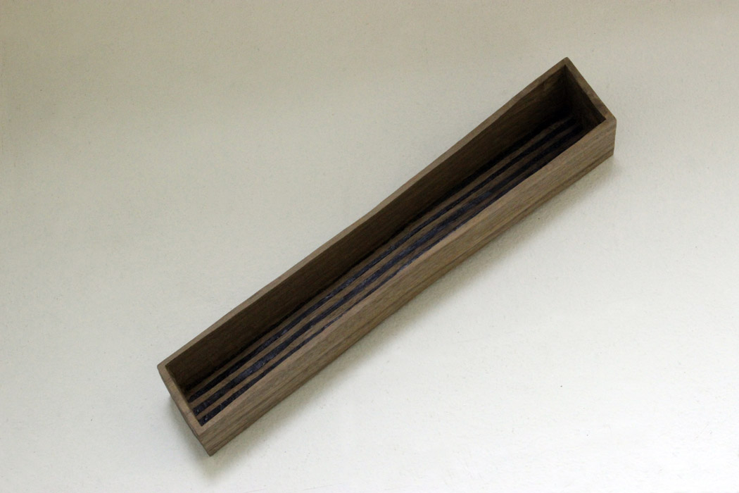 Box (interior). American walnut, silvered copper wire, tar  7 x  32 cm