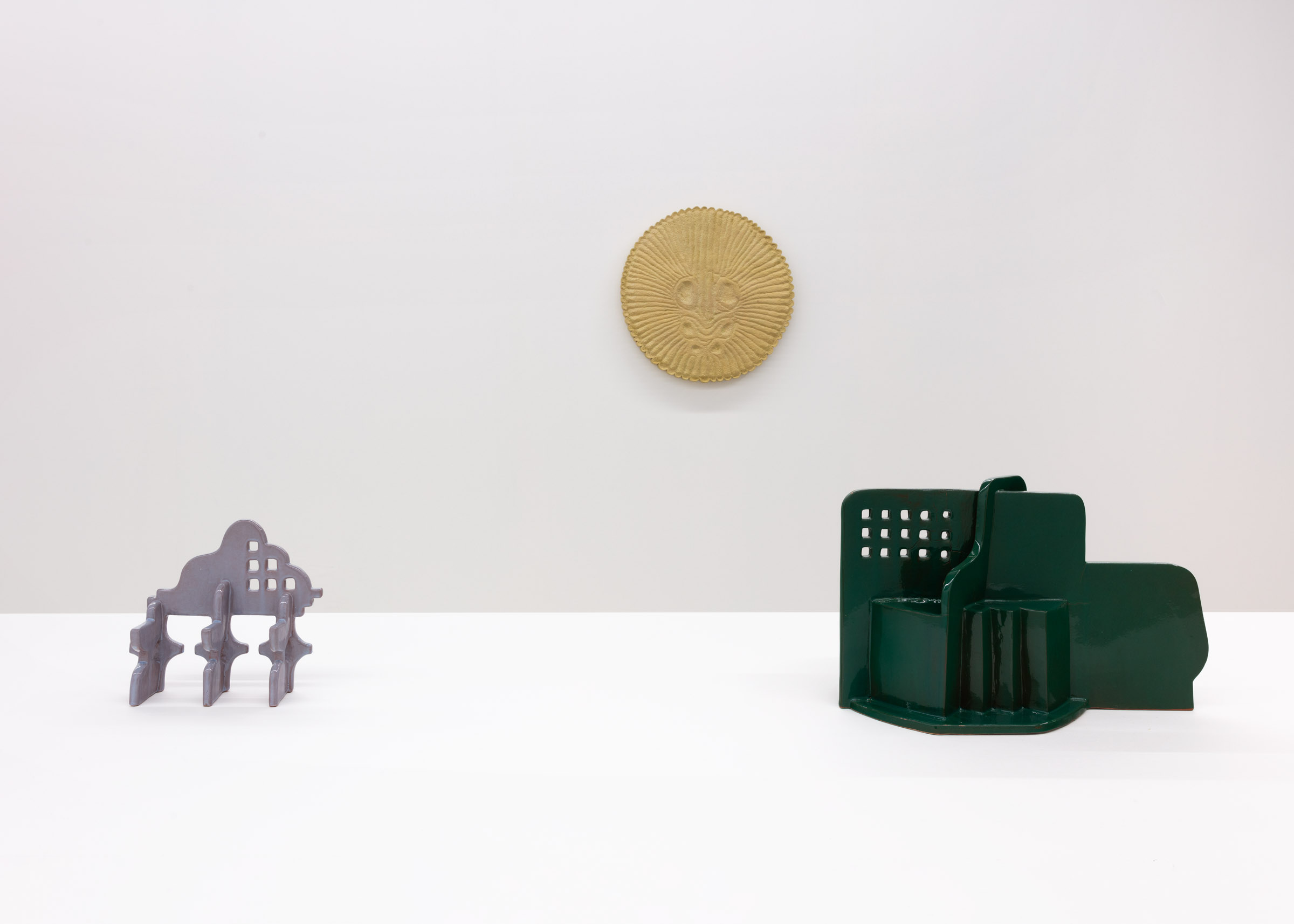 L to R :Alex Morrison Untitled 2 2022 Glazed and fired ceramic, Megan Feniak limonite prayer 2022  limewood, milk paint, earth pigments, Alex Morrison Untitled 5 2022 Glazed and fired ceramic