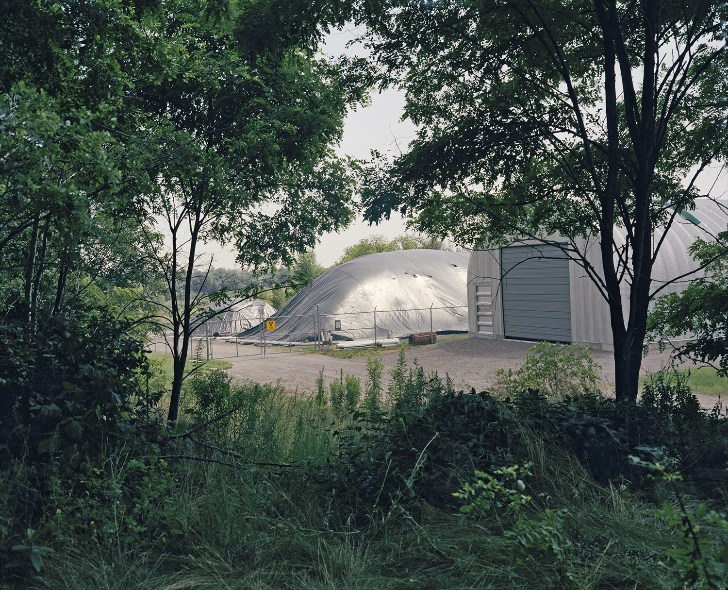 Pine Street Extension, radioactively contaminated soil under tarp, Port Hope, 1992