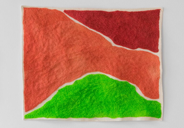Pictured: One square piece of hand dyed wool with red, orange and green sections.  