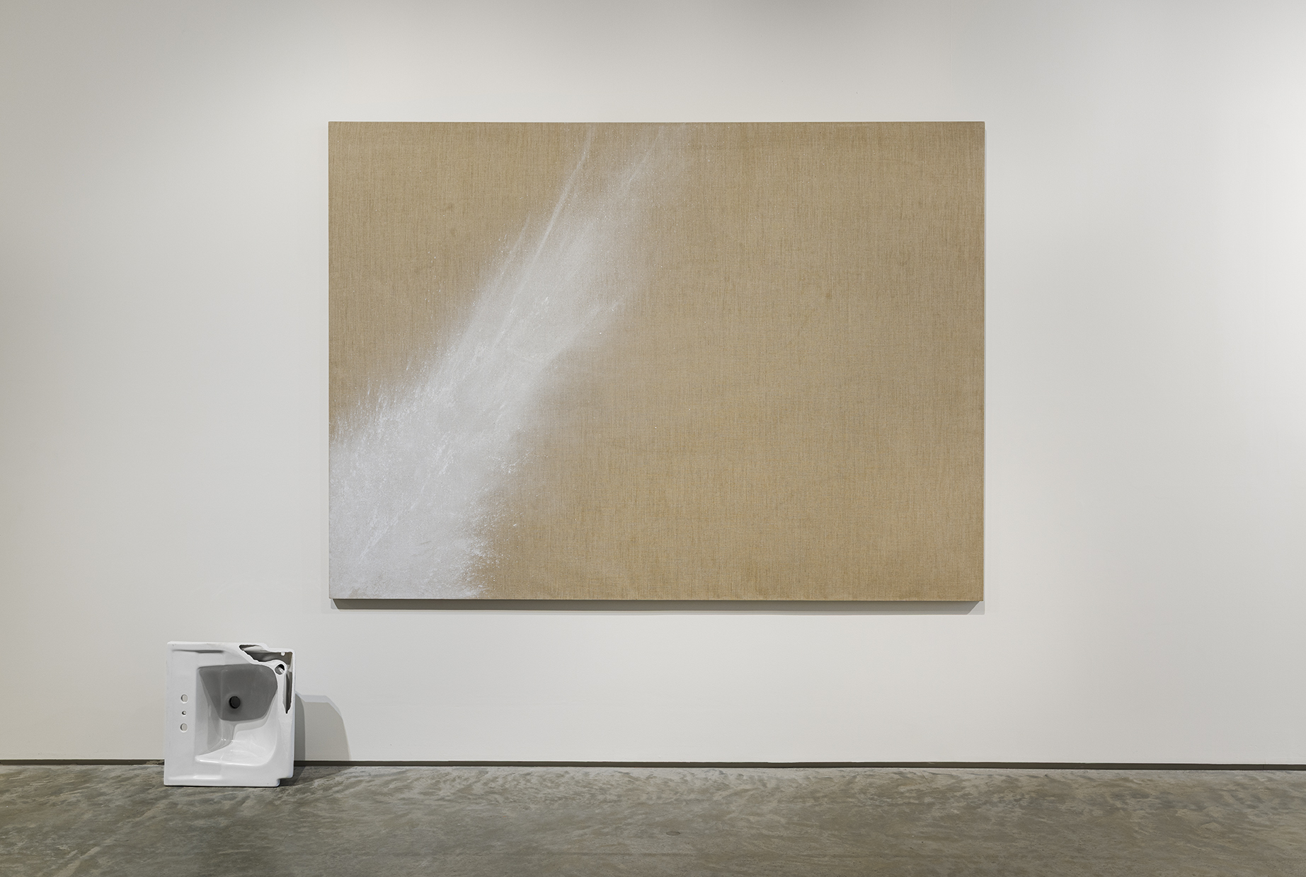 Analia Saban, Marking (from Porcelain Bathroom Sink), 2014. Found bathroom sink and ground sink pigment on linen canvas, ainting: 70 x 96 inches, sink: 18 x 20 x 10 inches. Photo by Etienne Frossard.