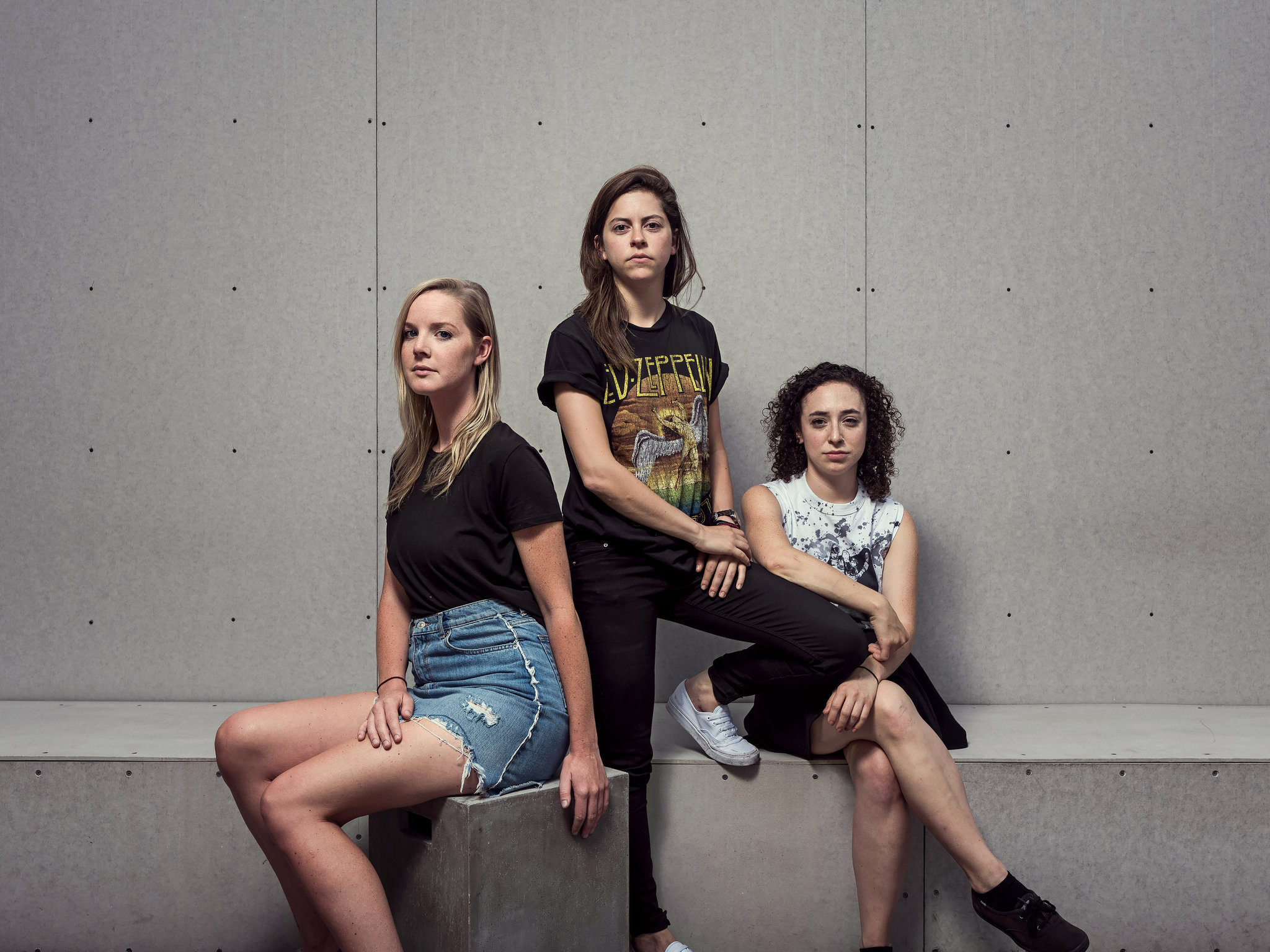 Rachel Renock, the chief executive of Wethos, center, with her business partners, Claire Humphreys, left, and Kristen Ablamsky. Ms. Renock said they received sexist comments while seeking financing.