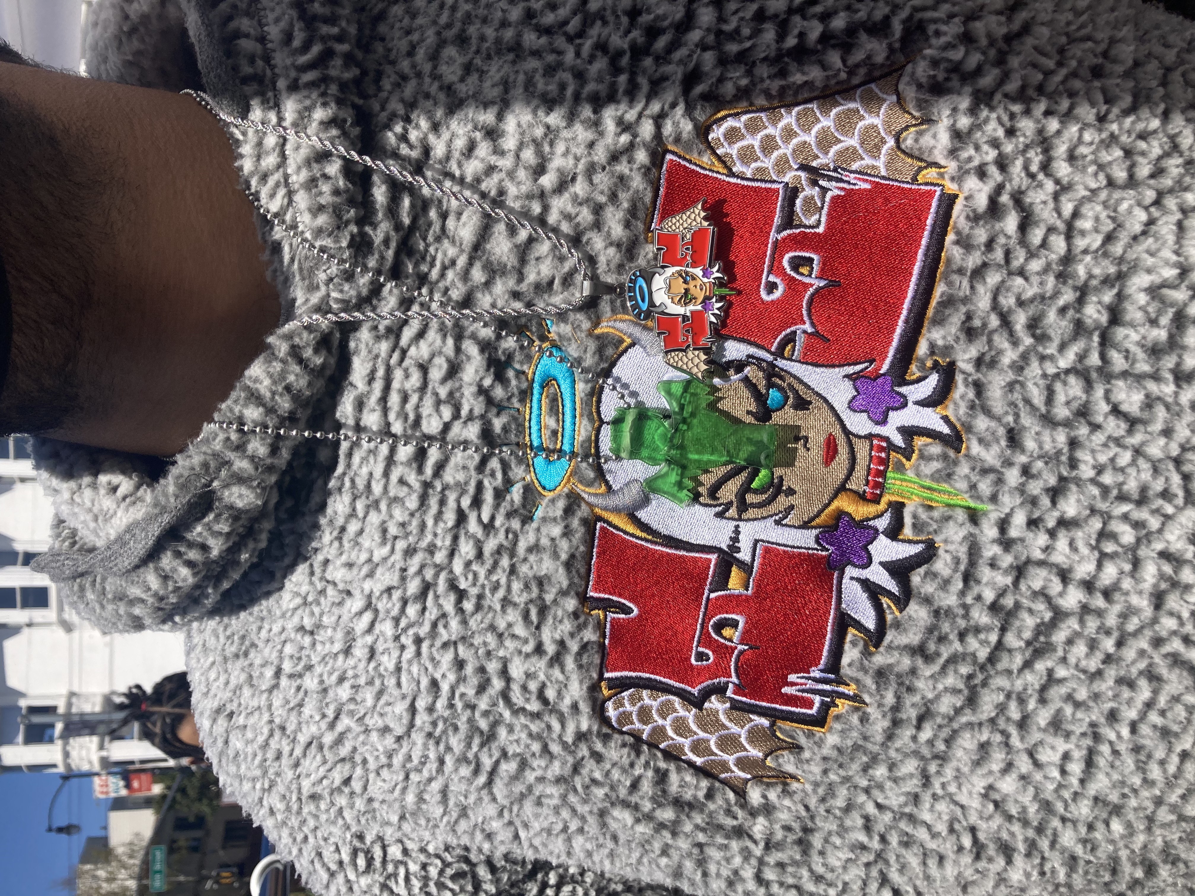 SOS 'Angels & Demons' hoodie, layered with 2 custom chains 