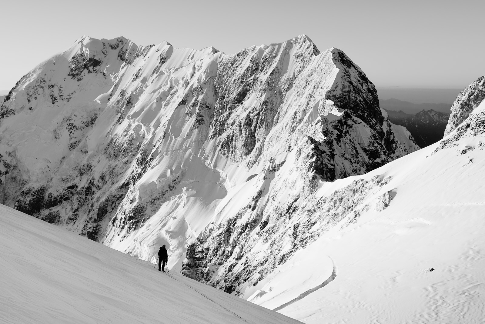 On Janga-Tau (5058m), Shkhara (5193m) in the background. Climber: Robert Koschitzki. LFI Mastershot