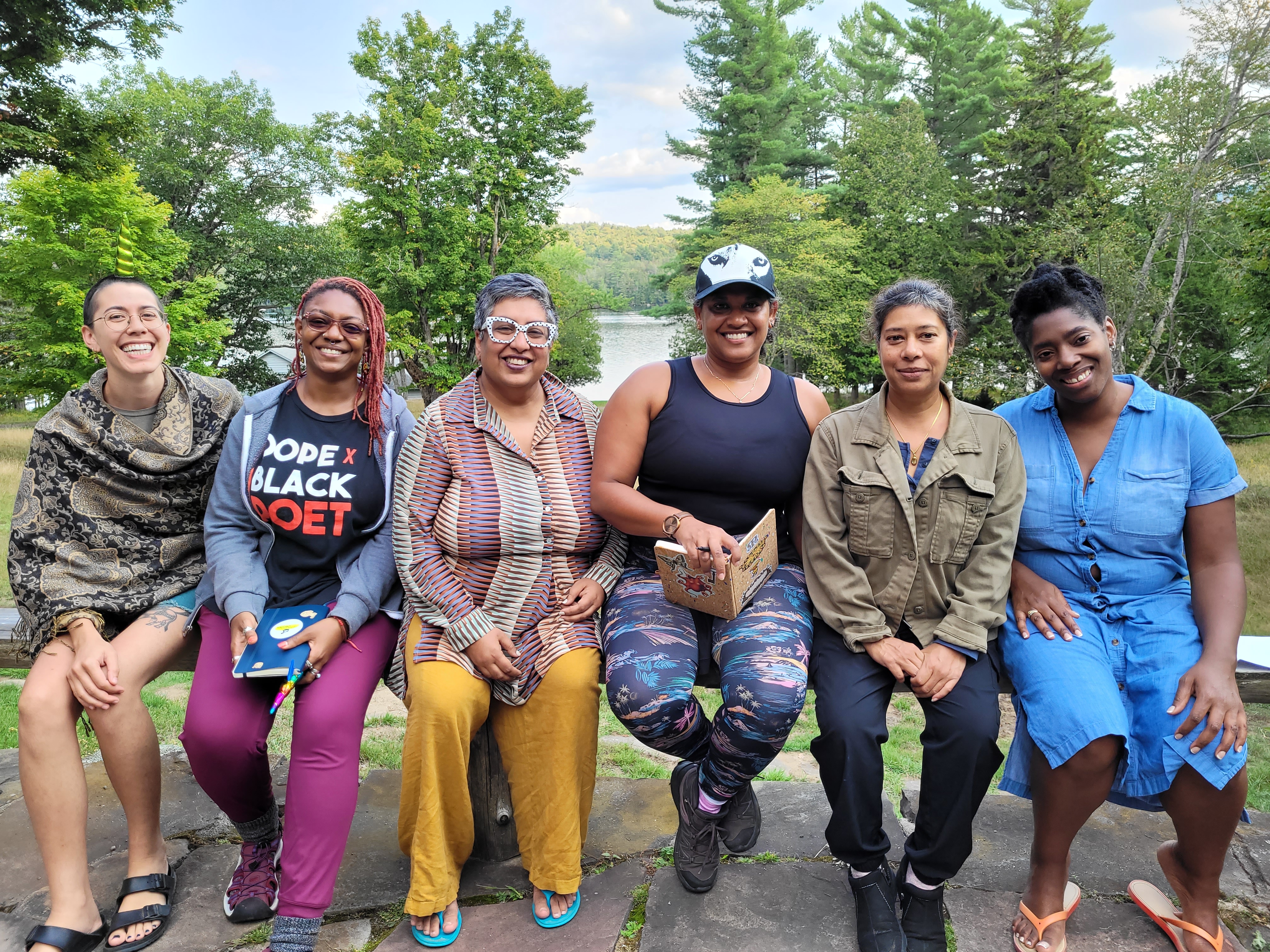 (From left) Jhani Randhawa and team members of the Unicorn Authors Club and Narrative Initiative at Blue Mountain Center in Blue Lake, New York. September 2022.