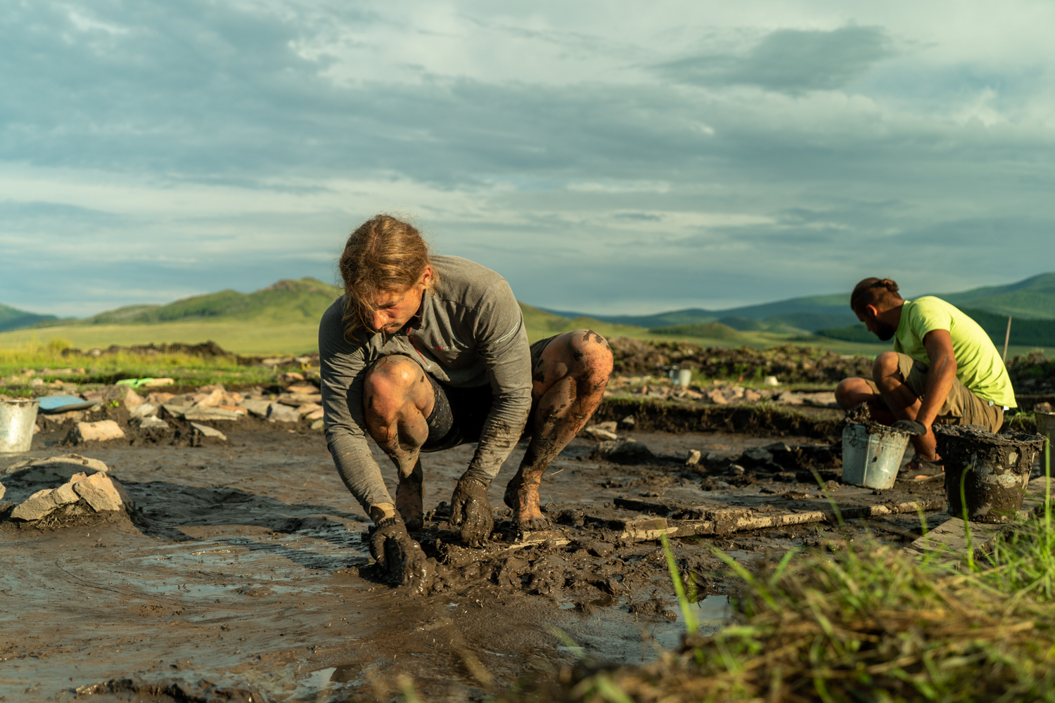 Lead archaeologist Gino Caspari cleaning a trench for documentation. Caspari discovered the burial mound using satellite imagery.
