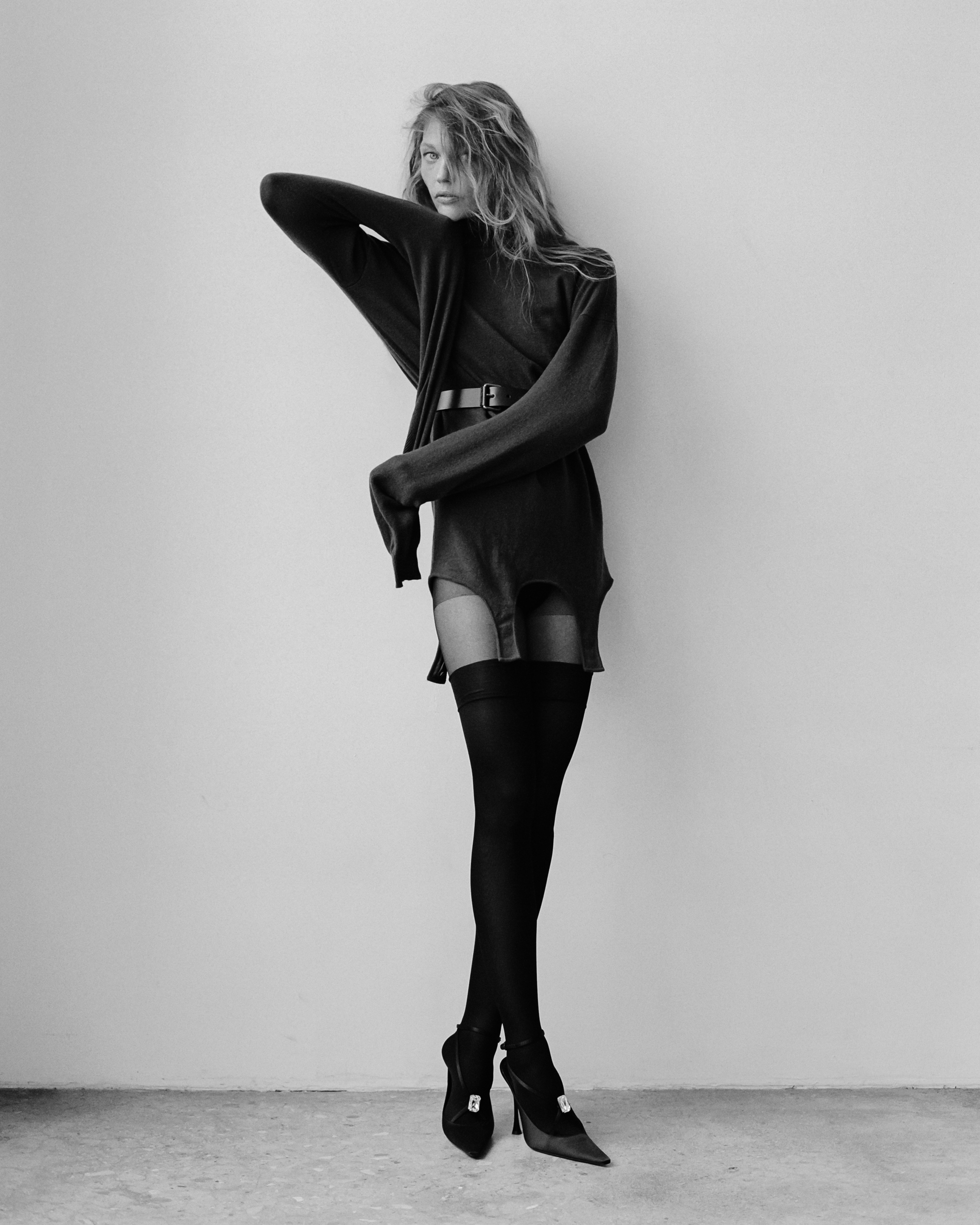 Saint Laurent sweater, earring, belt, underwear, tight, stocking, shoe.