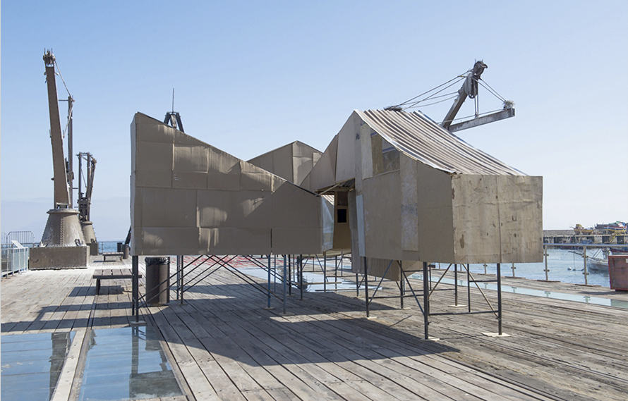 Spite’s pavilion, 2017. Temporal installation. Mixed media, metal scaffolds, cardboards, wood, audio speakers and audio players. Dimension variable.