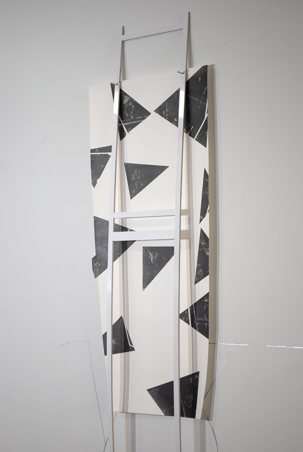 pale trinity  Graphite on paper. Metallic paint and incisions on wall. Formica and wood.  2011 - 83 x 37 x 1