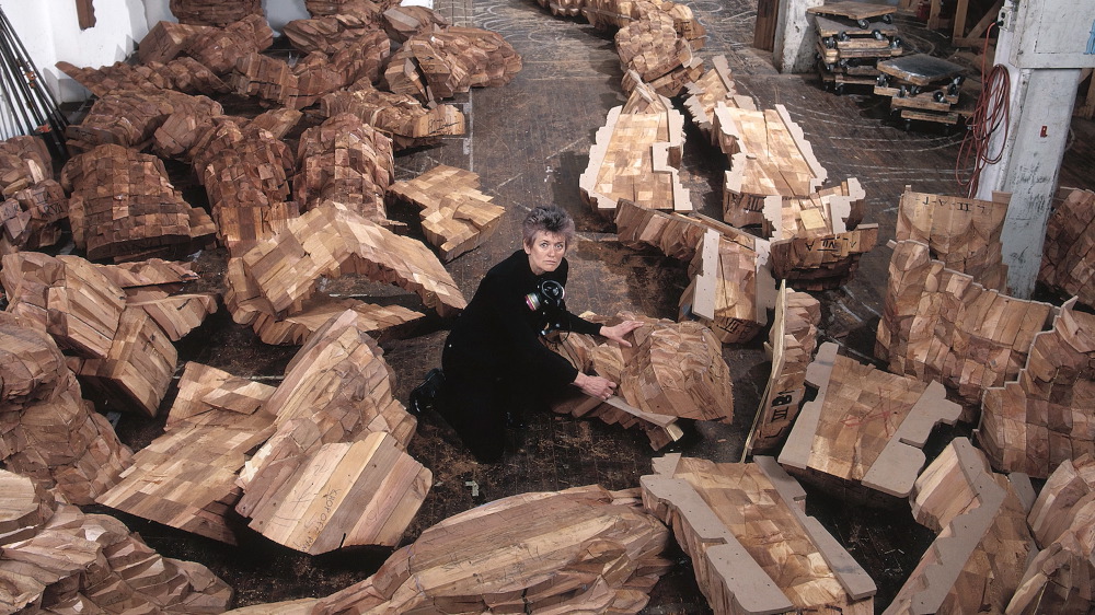 Von Rydingsvard in her Williamsburg studio on South 5th Street, surrounded by the cedar cast of Katul Katul, 2002.