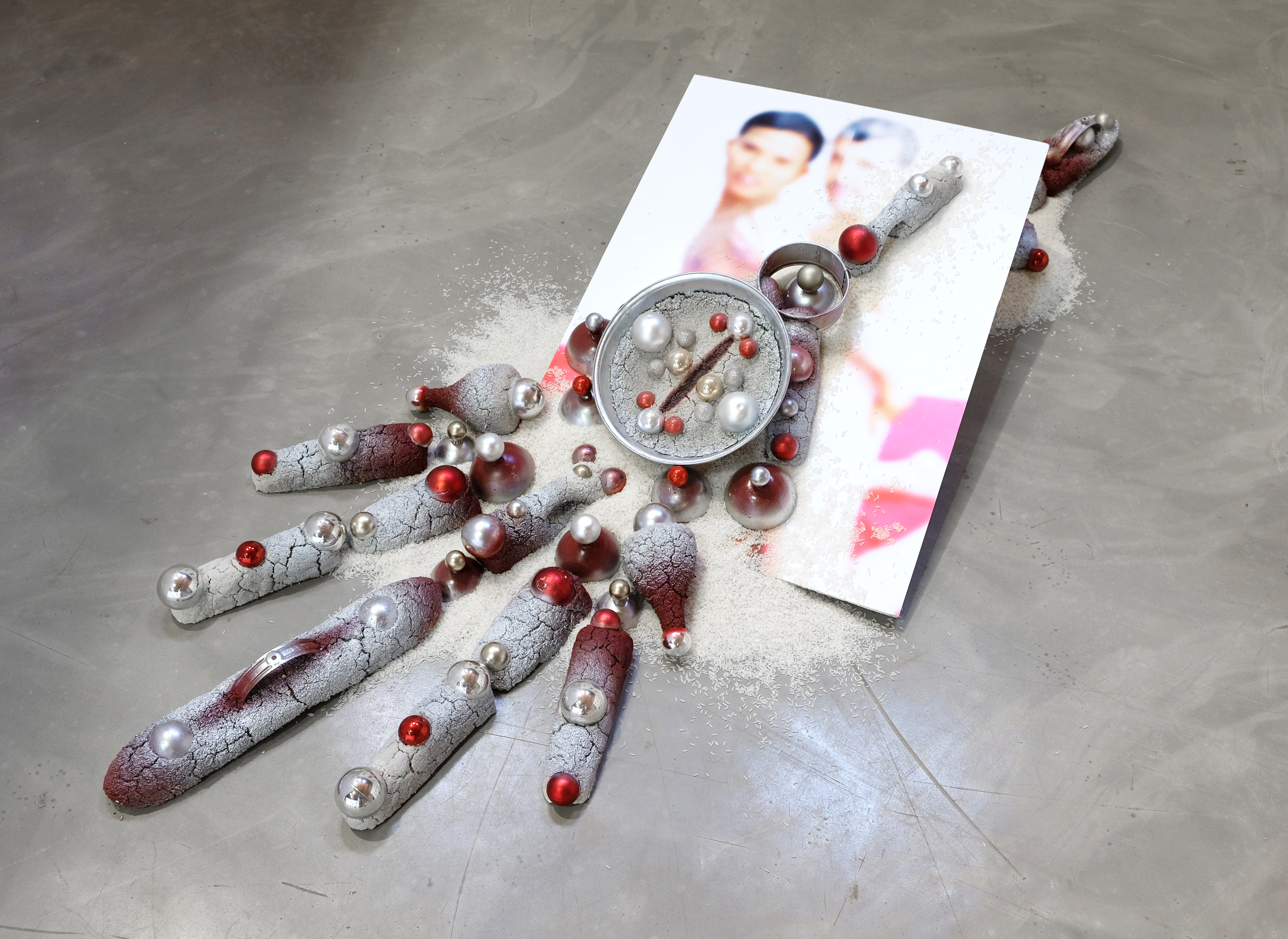 Footprint toward a New Metaphor. Image Print Mounted on Foam Board, Rice, Cement, Metal, Kerstbal. 3*2*1.5m. 2023.