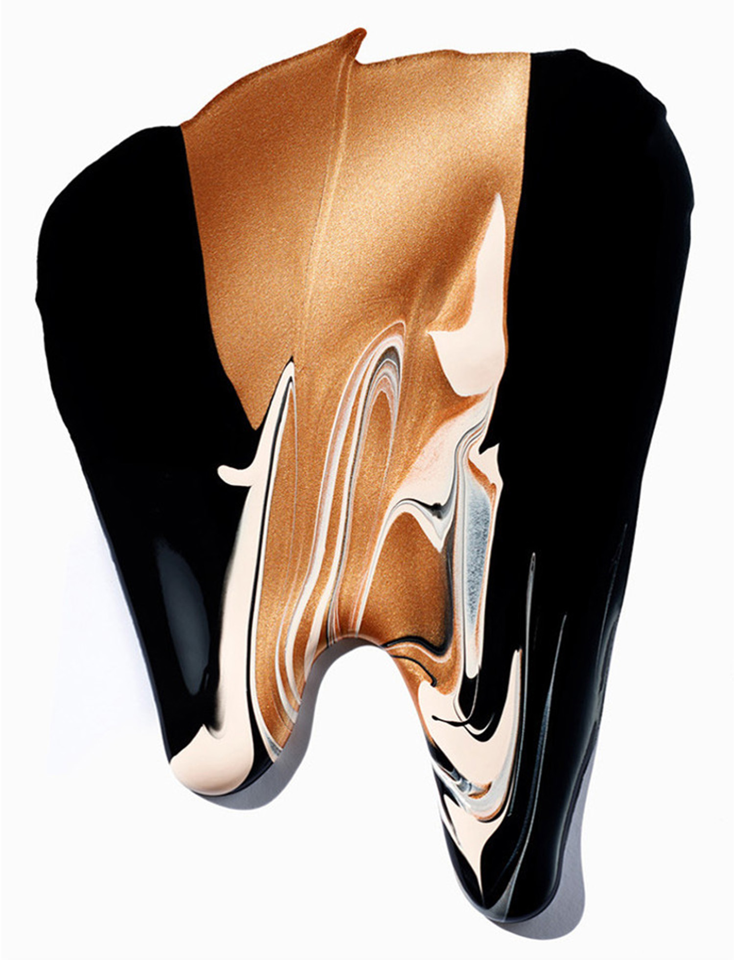 Photography agency KMA / King Management Agency stylist Sara Wacksman creates melted Dali shape using black and bronze paint.