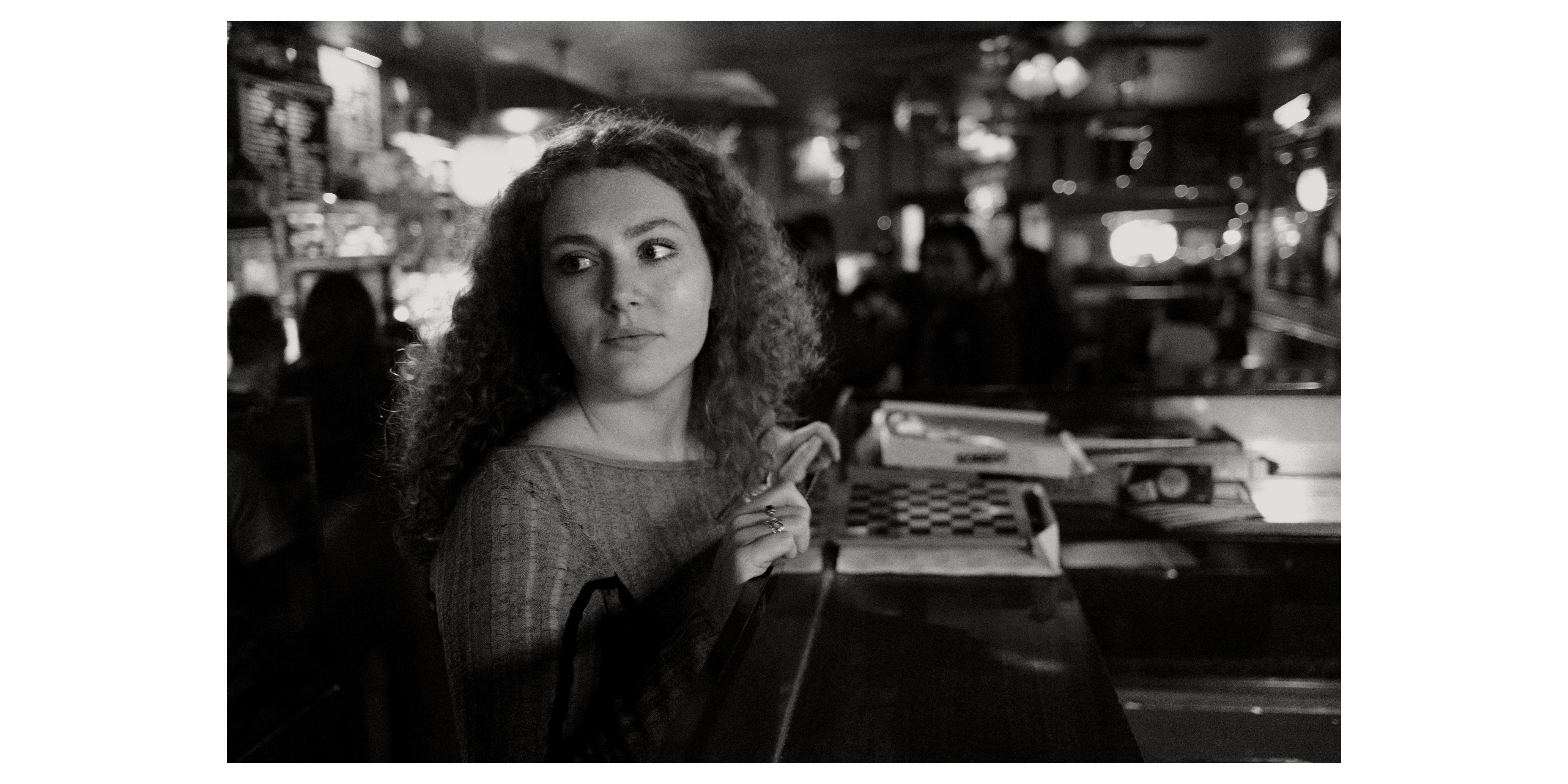 Stephee at the bar, Bushwick, NY, 2024