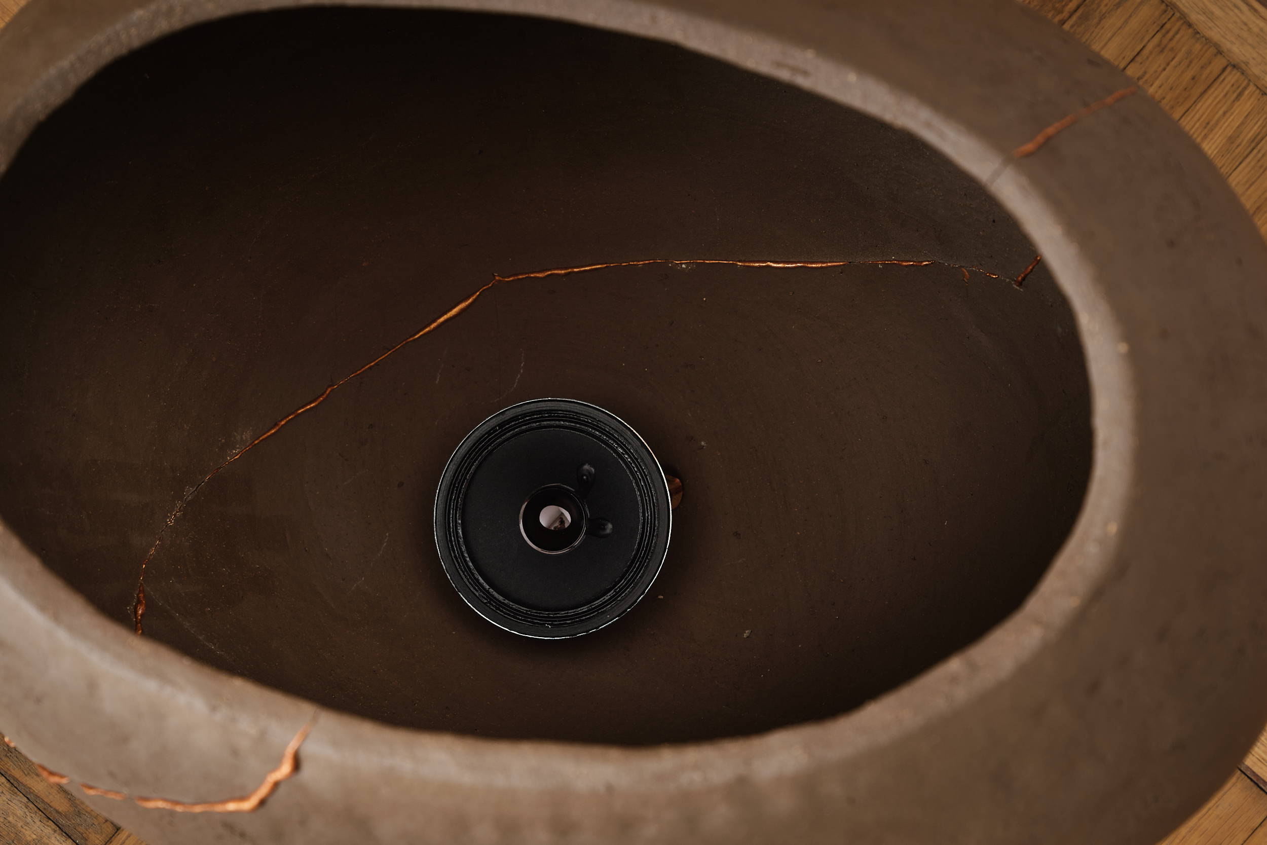 donna Kukama, Alchemies for watermelon futures (Congo) (2025) | Ceramic, epoxy resin, copper powder, speaker, audio, cables, approx. 30 x 25 x 35 cm (detail)