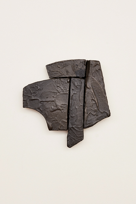 COAT OF ARMS #3Clay, tar, graphite.23.5 x 23.5cm.2022