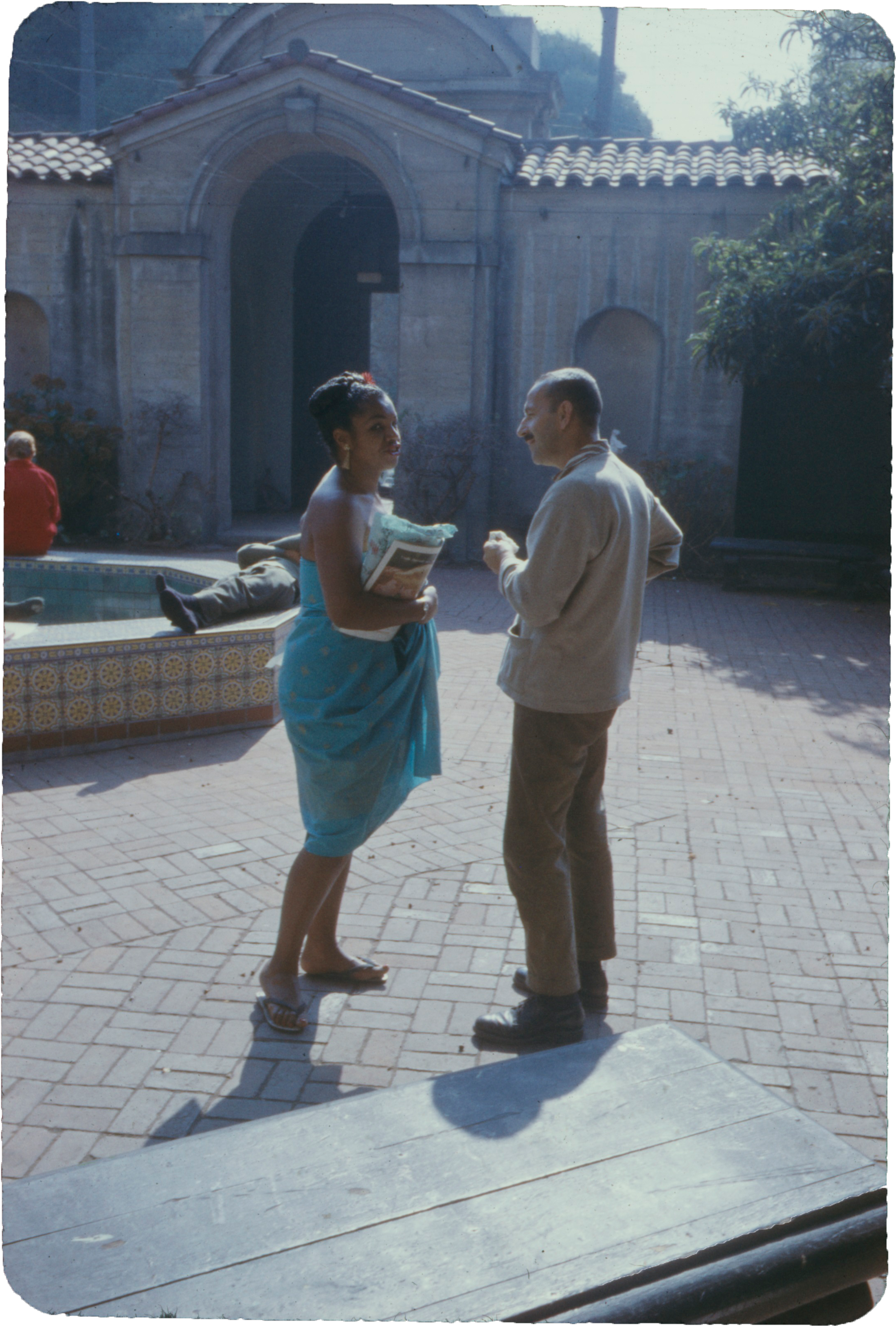 c. 1958: Flo Allen, model, in the courtyard.