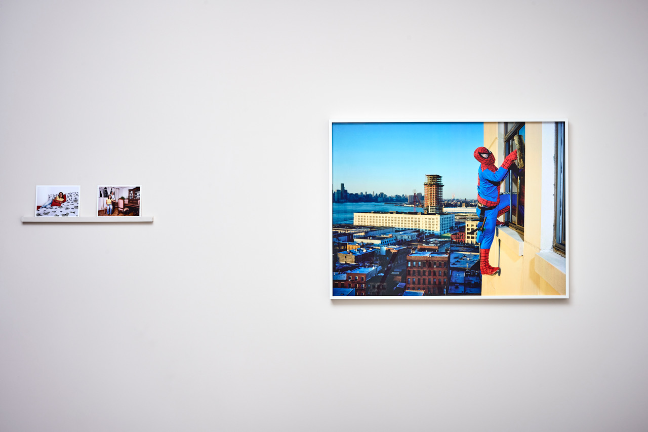 From left to right: Dulce Pinz&oacute;n, "Bernab&eacute; and Minerva with Family," 2008, photography, 5 x 7 inches each; "Bernab&eacute; M&eacute;ndez from the State of Guerrero works as a professional window cleaner in New York. He sends 500 dollars a month," 2004-2005, photography, 30 x 40 inches. Photo by Go Sugimoto.