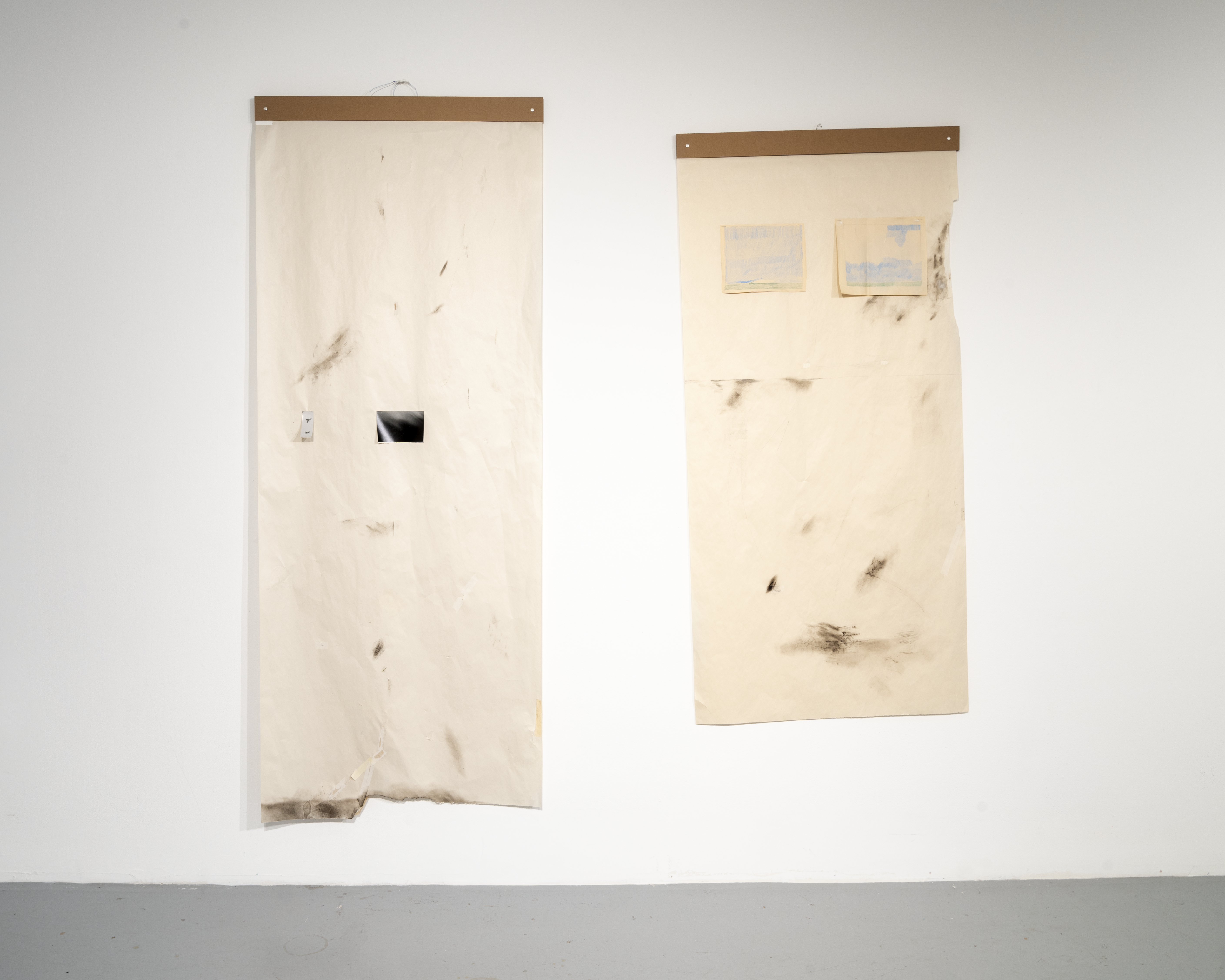 Untitled, 2022-2023. Soot and wax on newsprint, mended with numerous things, various dimensions.