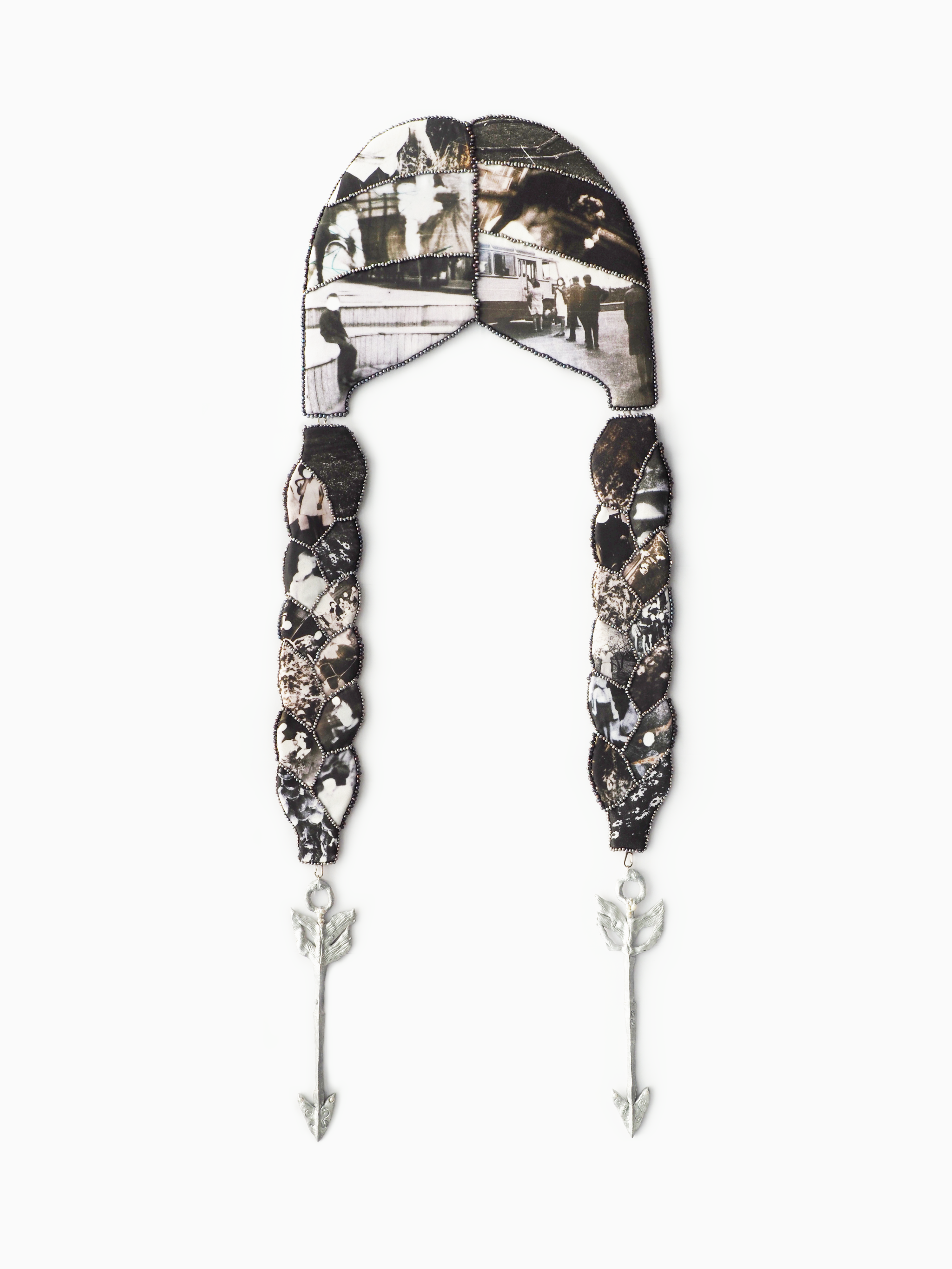 Braids of Remembrance, 2025. Canvas, wool, retouched archival family photos printed on textile, felt, freshwater natural pearls, plastic clay. 157 x 54 cm