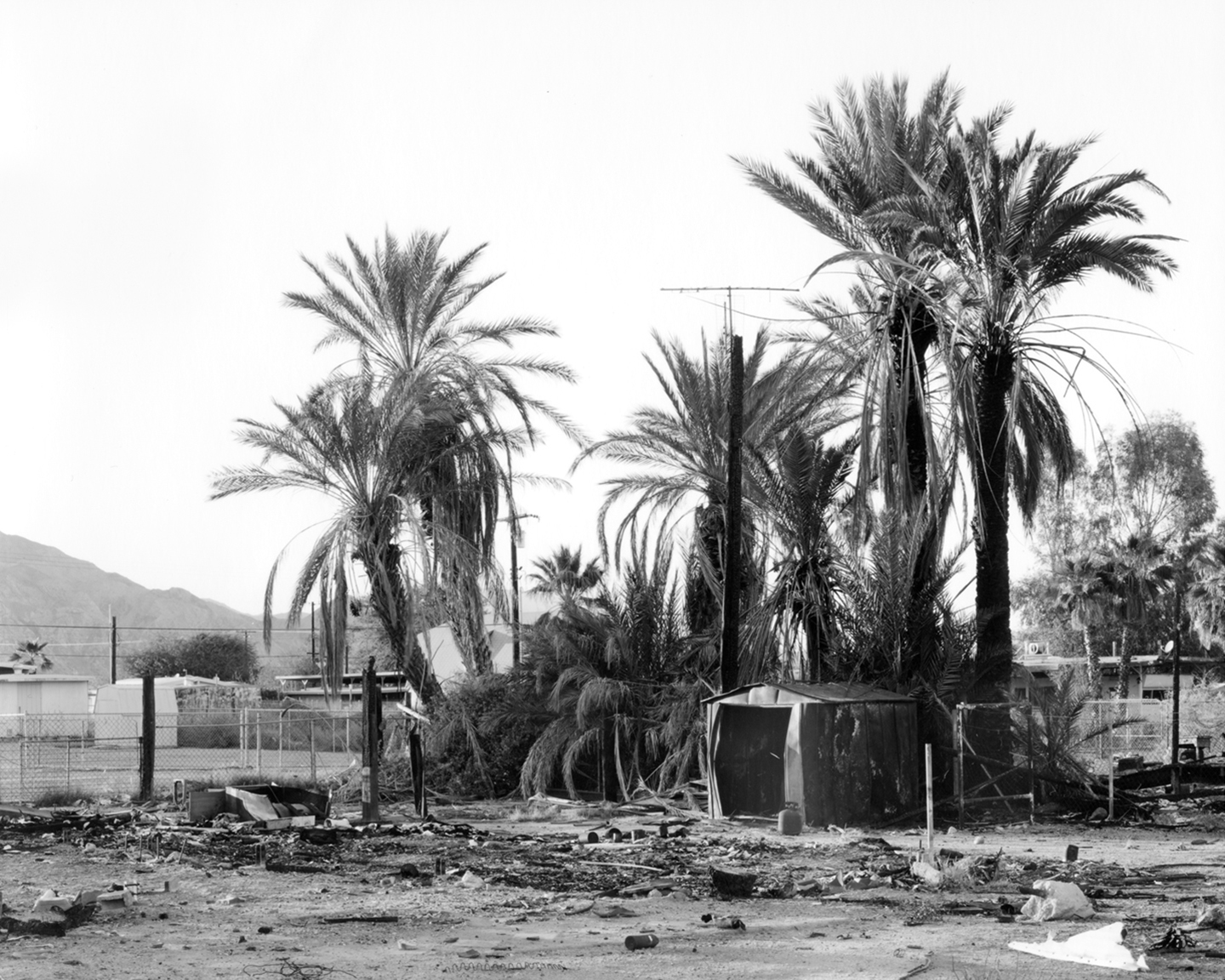 Burned down home approximately 23.6 miles from test site. Salton Sea Beach, CA. Silver Gelatin Print 2015