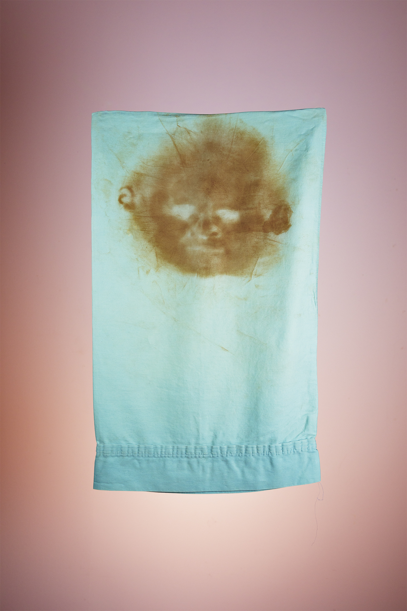 Salim., 2019Coffee rubbing portrait over gifted pillowcase