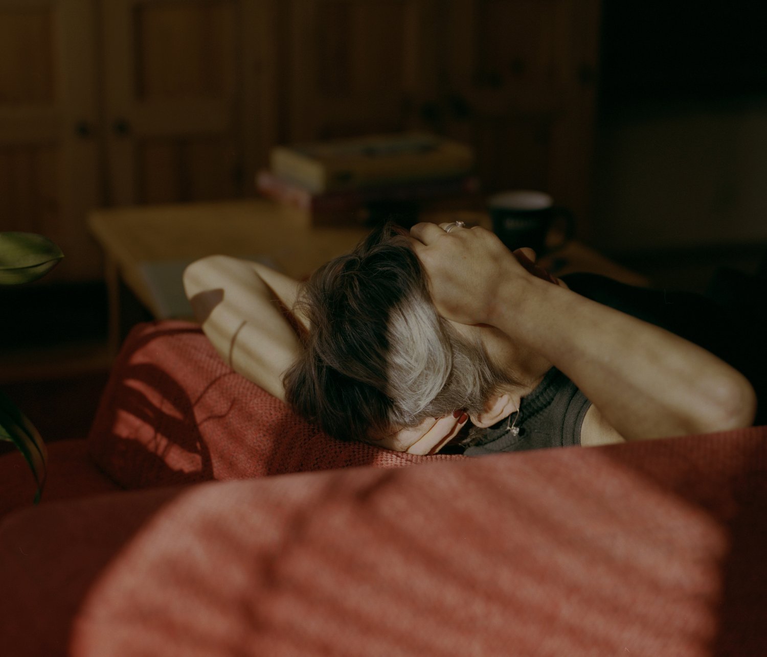 Mom resting on the couch. Gniezno, Poland, 2019