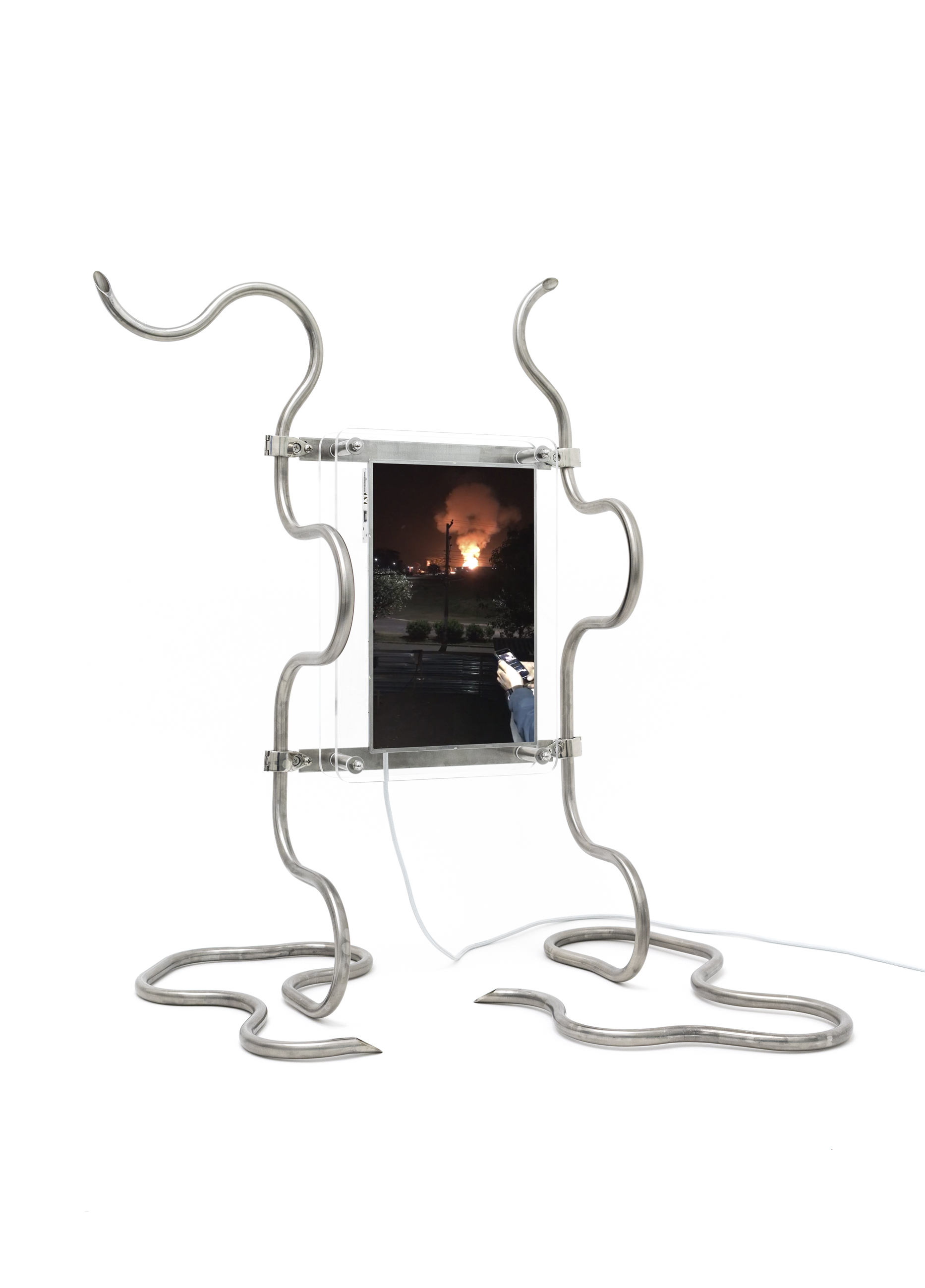 Amalia Lindo, The Cloud is of the Earth (v.3), 2021, Single channel video installation, audio, 17” liquid-crystal display panel, LCD controller board, stainless steel tube, acrylic perspex, 94 x 90 x 70 cm, 9 mins 13 secs