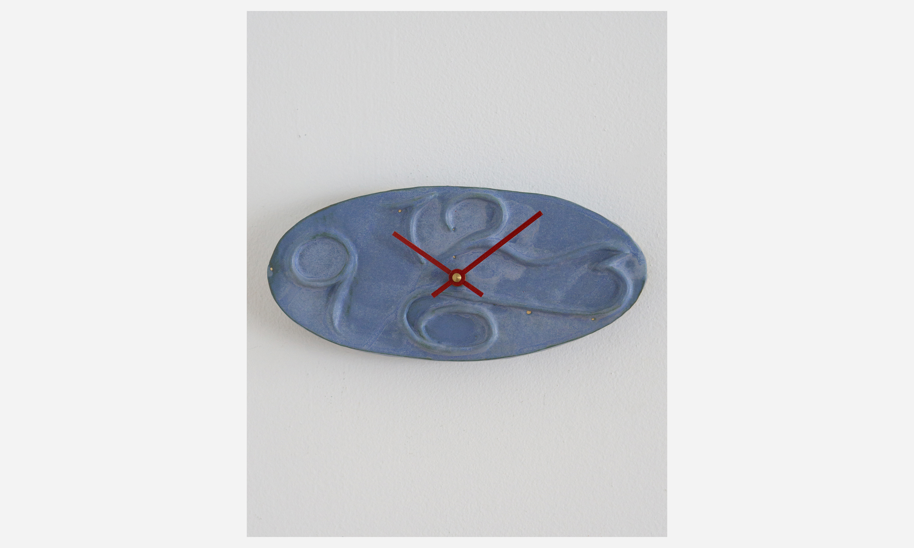 4 Numeral Oval Clock, glazed ceramic, 10 x 4.5 x 2 inches, 2024