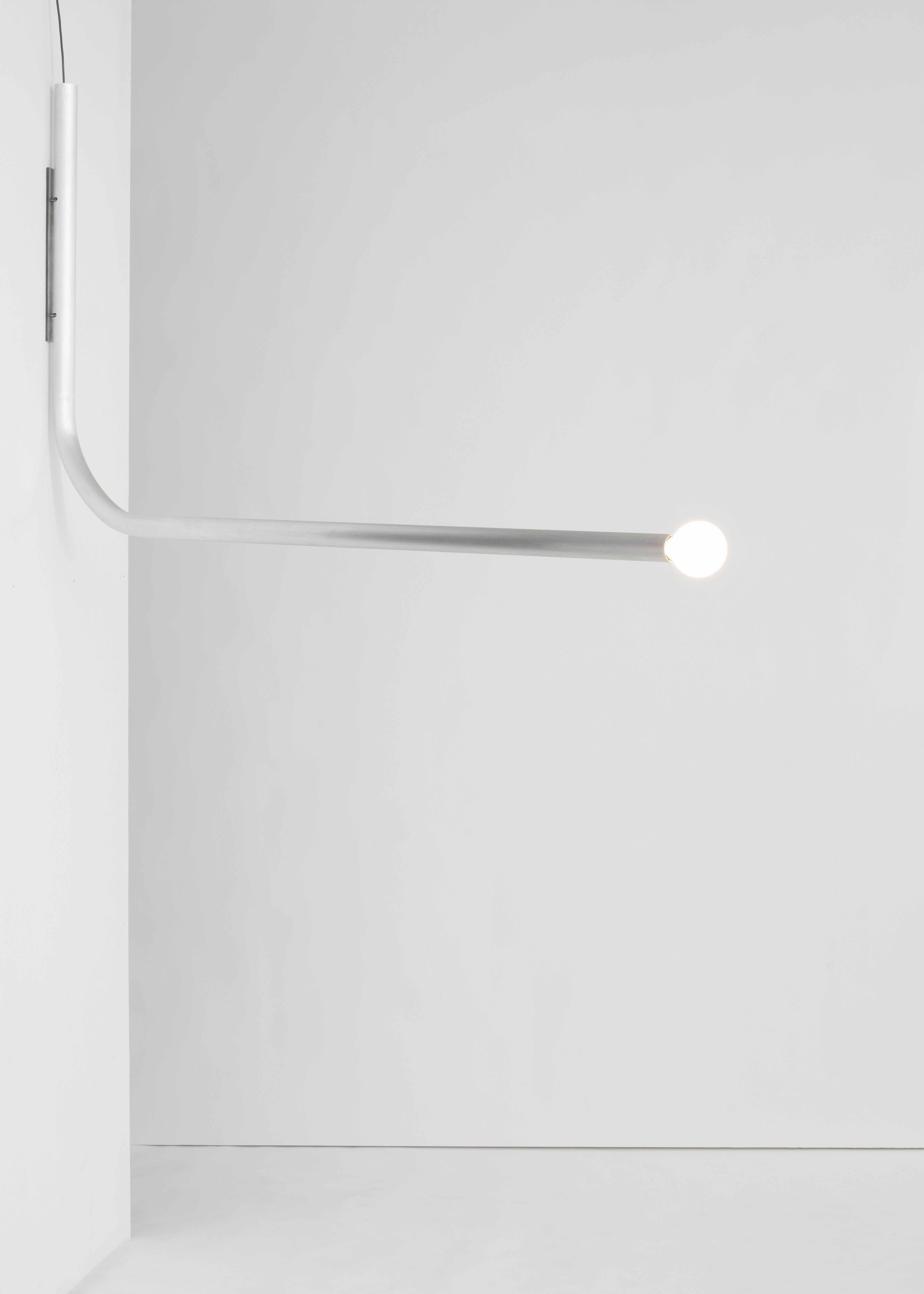 M.R. Wall Lamp, 2025 Aluminium sanded and waxed, svivel hinge, H 75 x W 135 x Ø 4 cm 