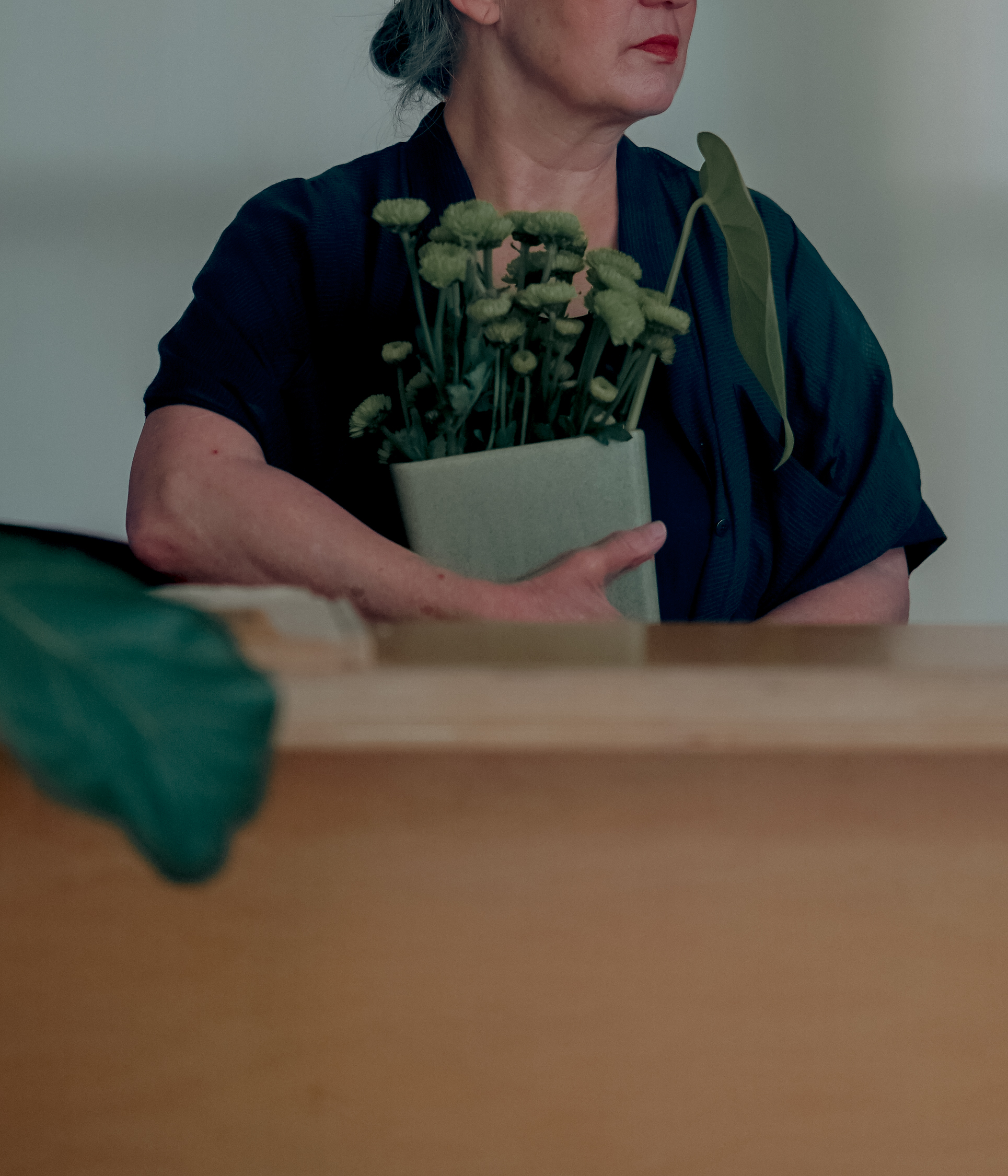 Plants add natural harmony to Leslie's solid-wood leading studio space.