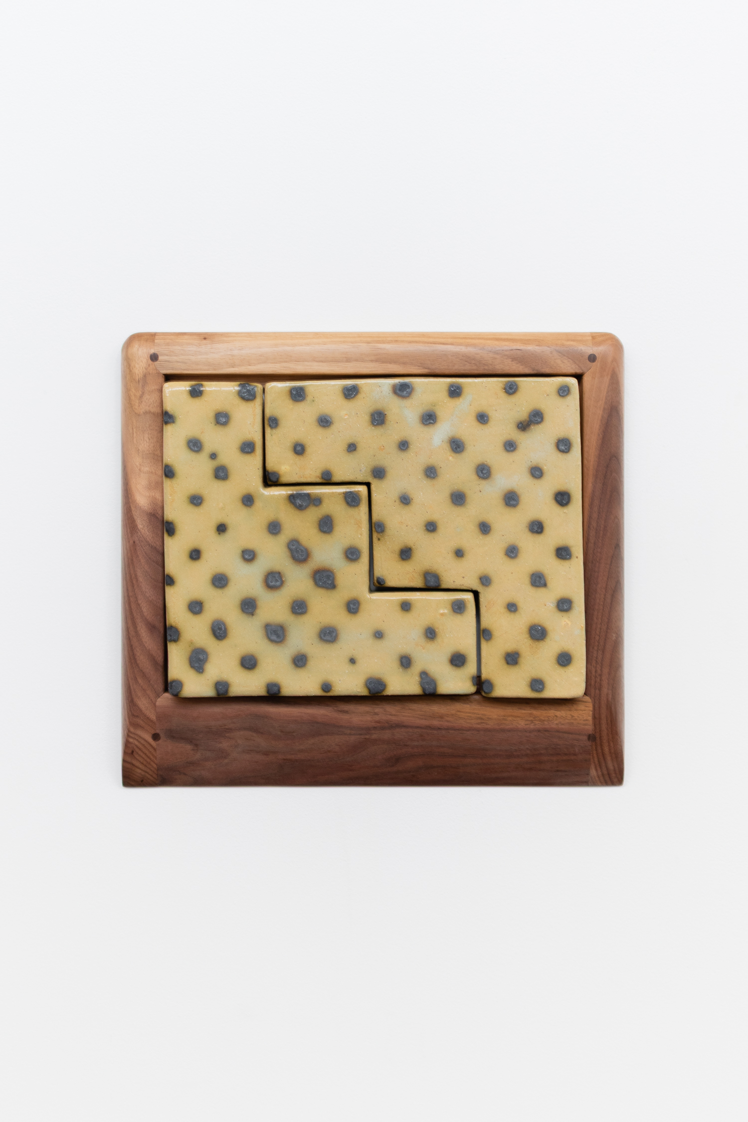 Jordan Mitchell-Fletcher, Untitled, 2025, Copper oxide, glazed stoneware, framed in Walnut, 40 × 44 cm