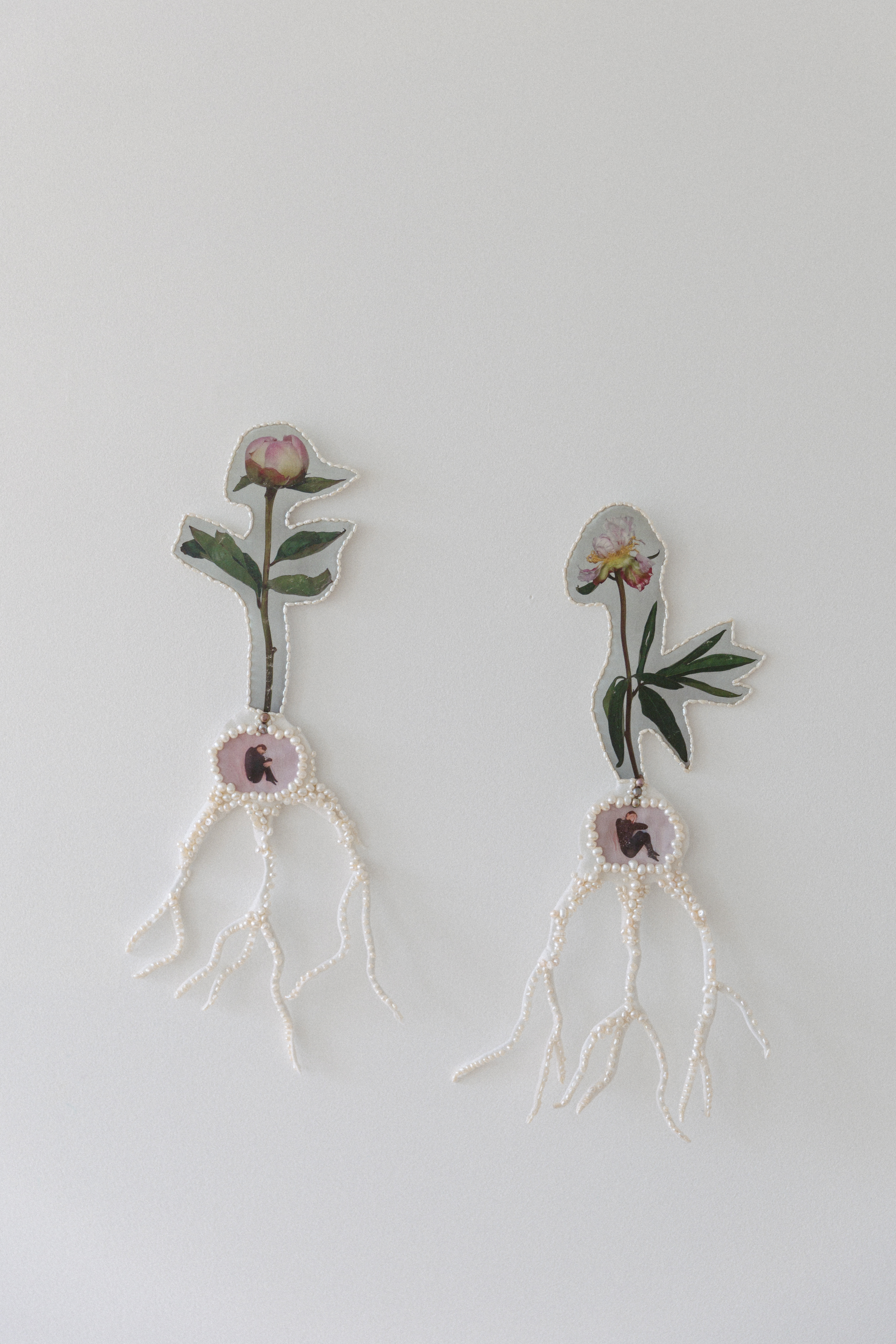 Birthplace (Roots) 1&2, 2024 Wool, hand printed self portrait and peony on textile, pressed cardboard, freshwater pearls 18 7/8 x 9 7/8 in 48 x 25 cm