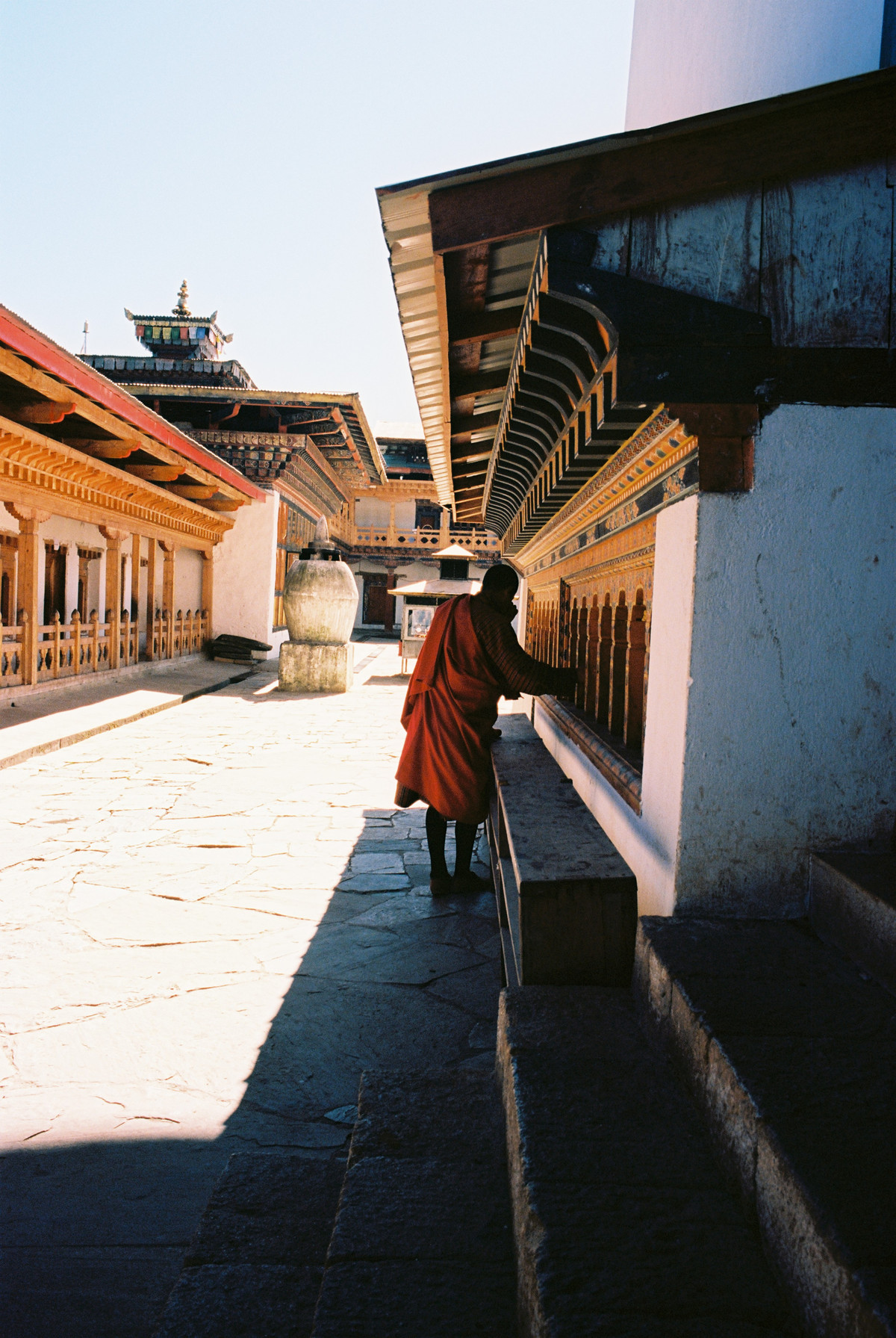 Monks spin prayer bells alongside Gangtey Monastery