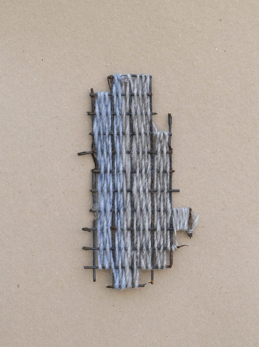 Horizon, 2018, Wool yarn and found lobster trap, 11.25 x 6 x .25 inches