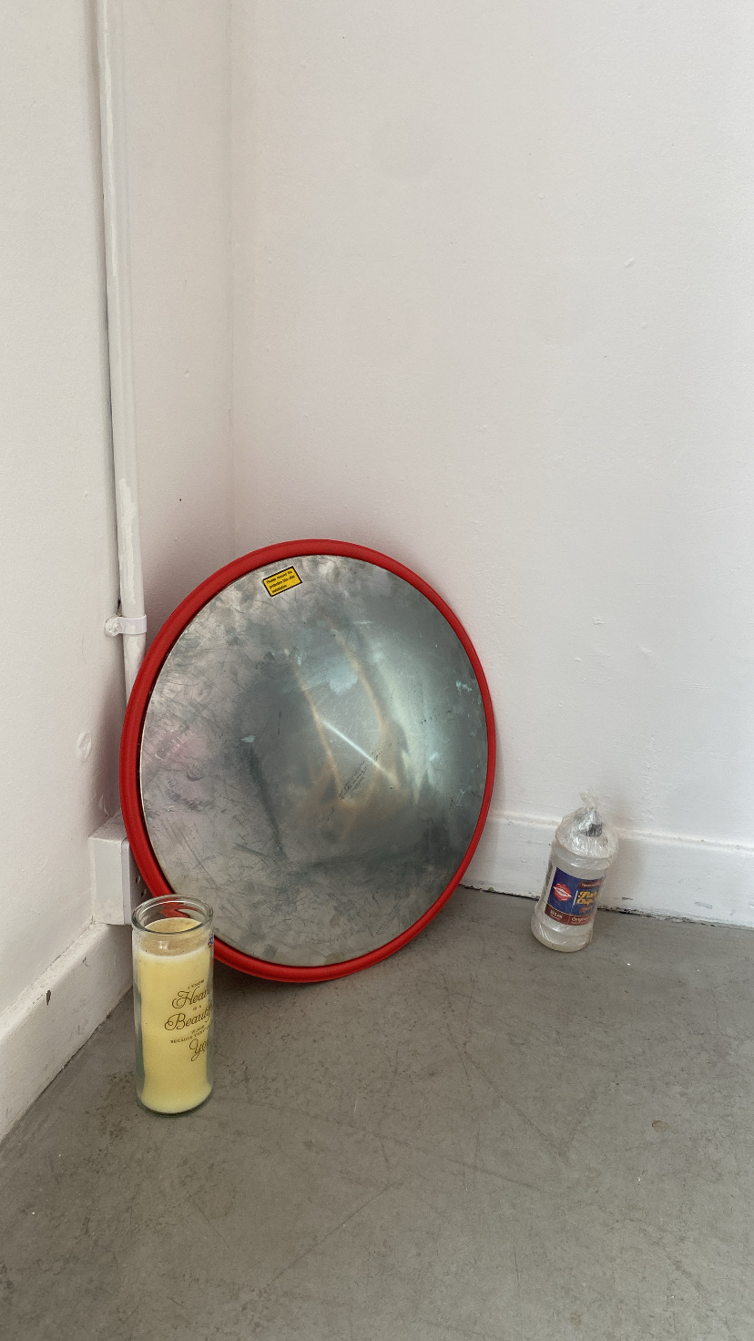 candle, mirror, vinegar bottle, cling film