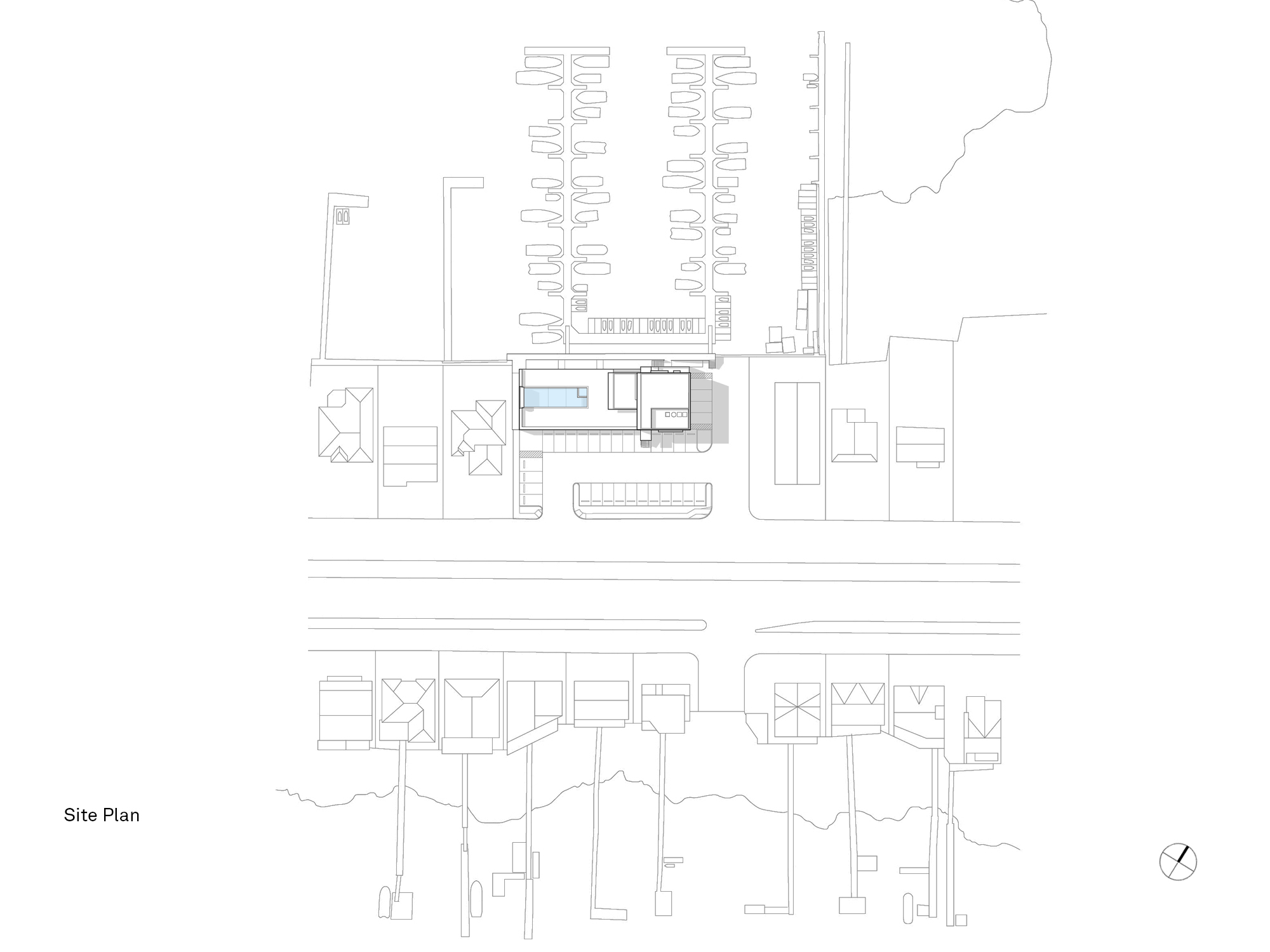 Architectural Site Plan of the Brigantine Marina and Paddle Club, illustrating the arrangement of the club building, elevated pool deck, parking area, and the layout of the deep-water marina docks.